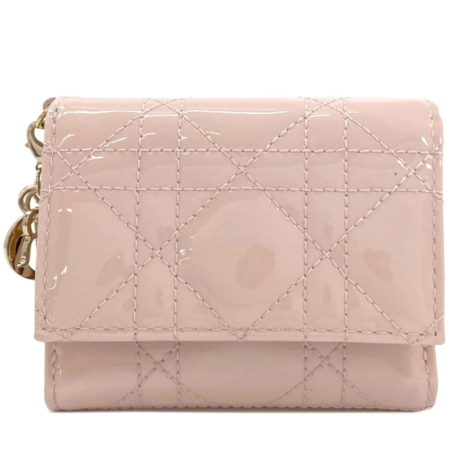 Patent Leather Bi Fold Wallet Christian Dior: Patent Leather Bi Fold Wallet Christian Dior Patent leather bi-fold wallet from Christian Dior, featuring pink color and sleek design. Made from high-quality patent leather, this wallet measures 8cm x