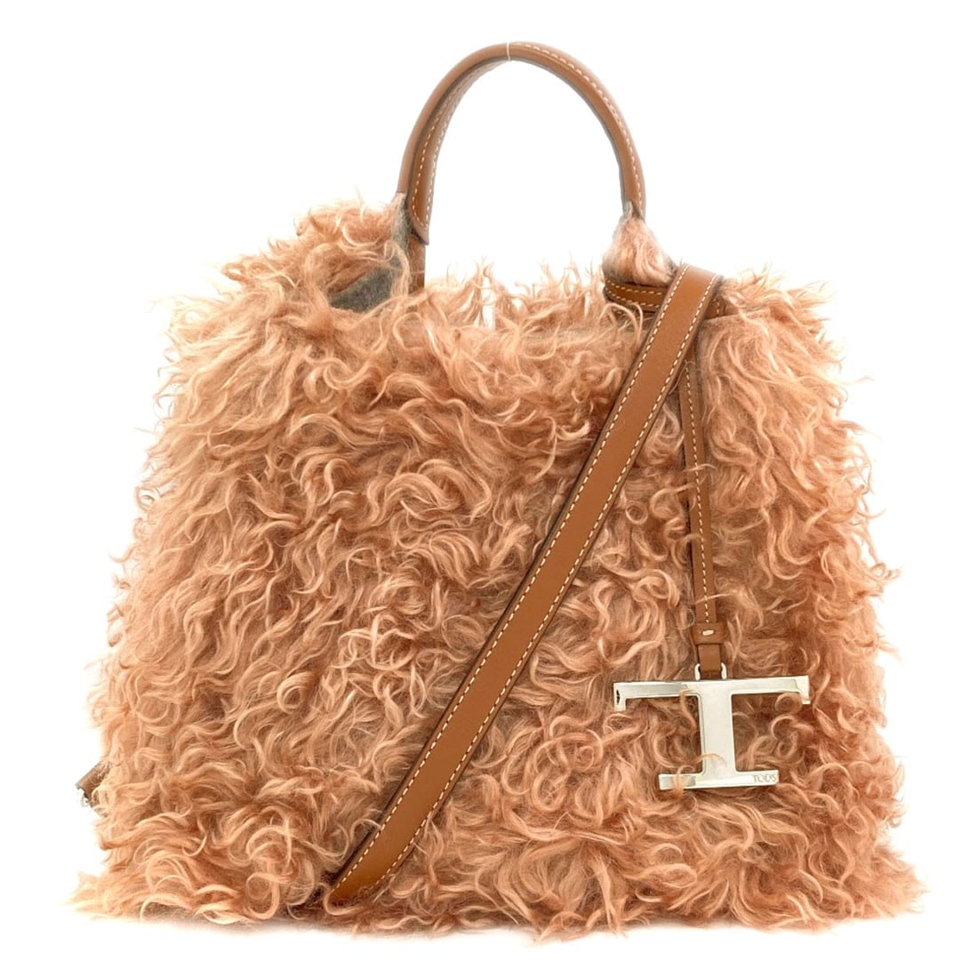 Tods 2Way Handbag Moheya: Tods 2Way Handbag Moheya Pink Moheya Tods 2Way Handbag. This pink handbag features an exterior made from Moheya, a unique material that adds a touch of elegance to its design. With its signature 2-way