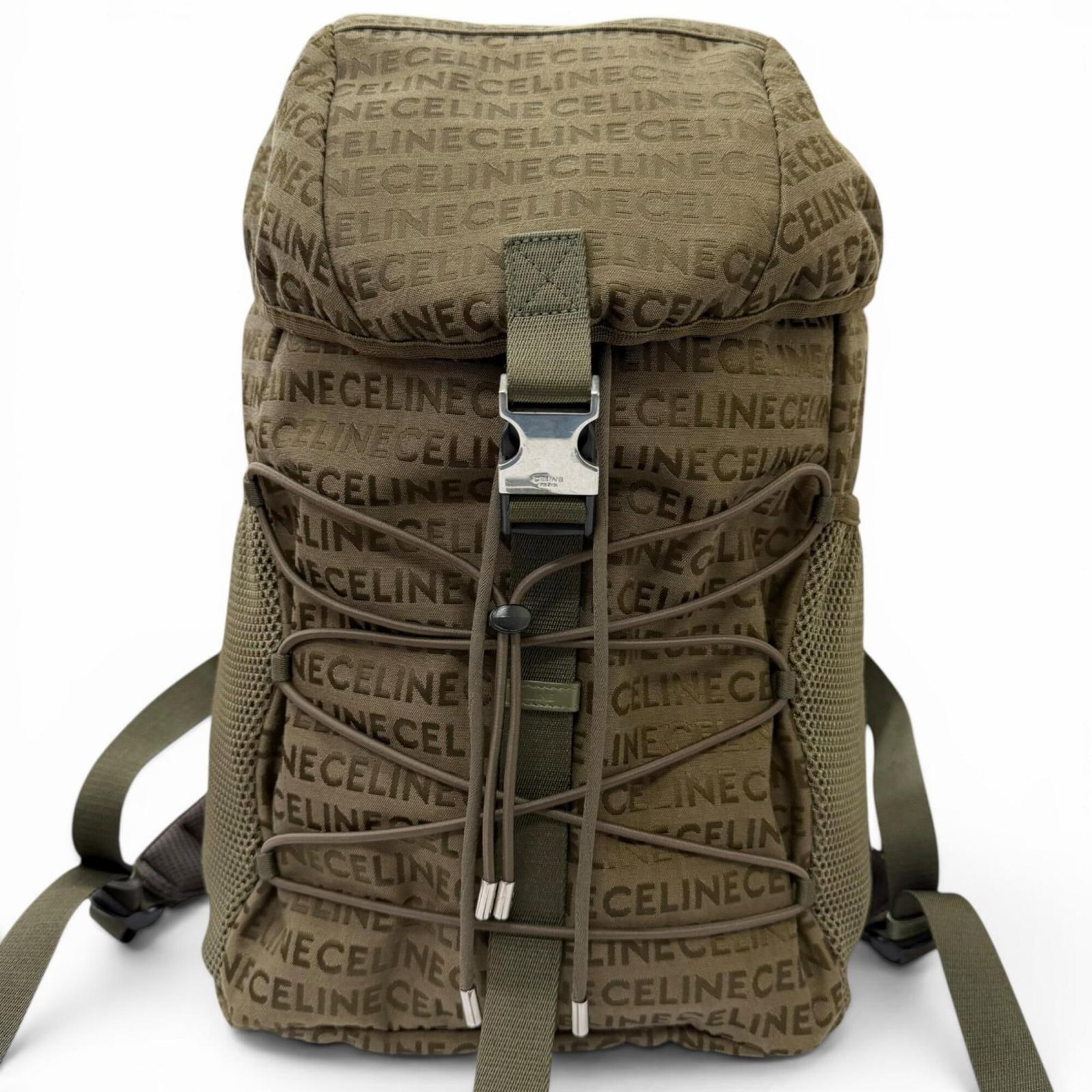 Leather Backpack Canvas: Leather Backpack Canvas Canvas and leather blend in this khaki-colored backpack, measuring 35cm x 28.5cm x 15cm. The canvas material provides a natural look, while the leather accents add a touch of s