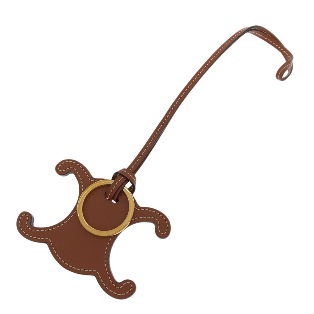 Celine leather ring key charm triomphe: Celine leather ring key charm triomphe Brown Celine leather ring key charm triomphe. Made from high-quality brown leather, this key ring features the iconic CELINE Style and Triomphe design. A stylish