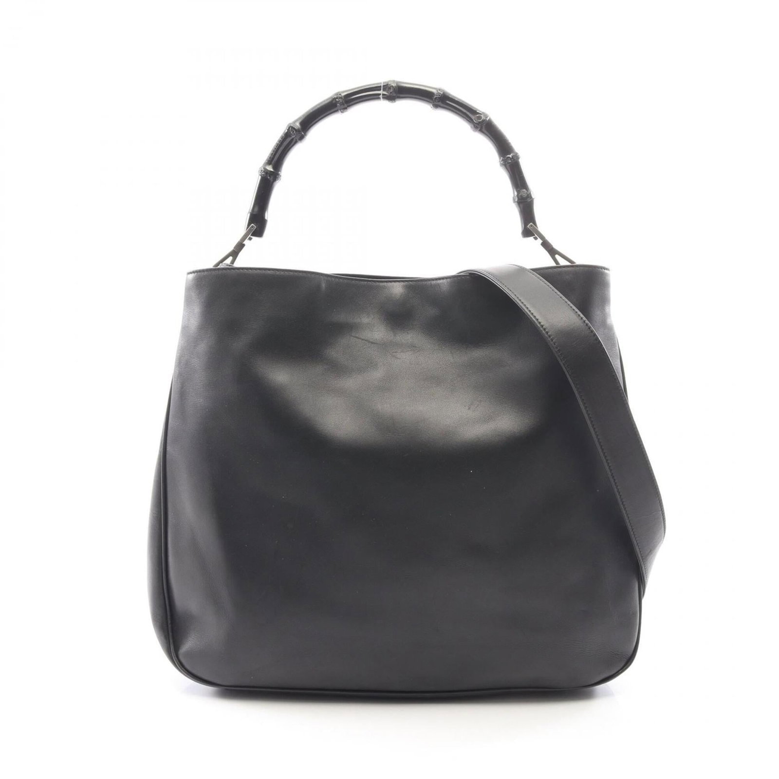 Handbag Leather Gucci: Handbag Leather Gucci The Gucci handbag features black leather construction with a signature. It measures 34cm x 39cm x 11cm and has a sleek, compact design. This stylish accessory is made from high-q