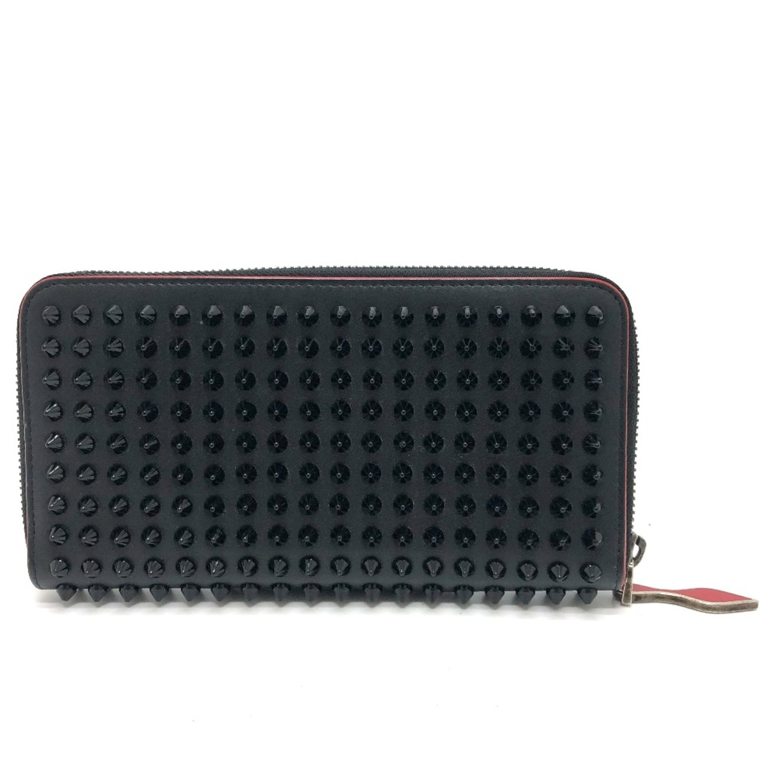 Christian Louboutin Leather Bi Fold Wallet: Christian Louboutin Leather Bi Fold Wallet Black Leather Bi Fold Wallet from Christian Louboutin, measuring 19cm x 10cm x 2.5cm, features a sleek design with a signature touch. This long wallet boasts