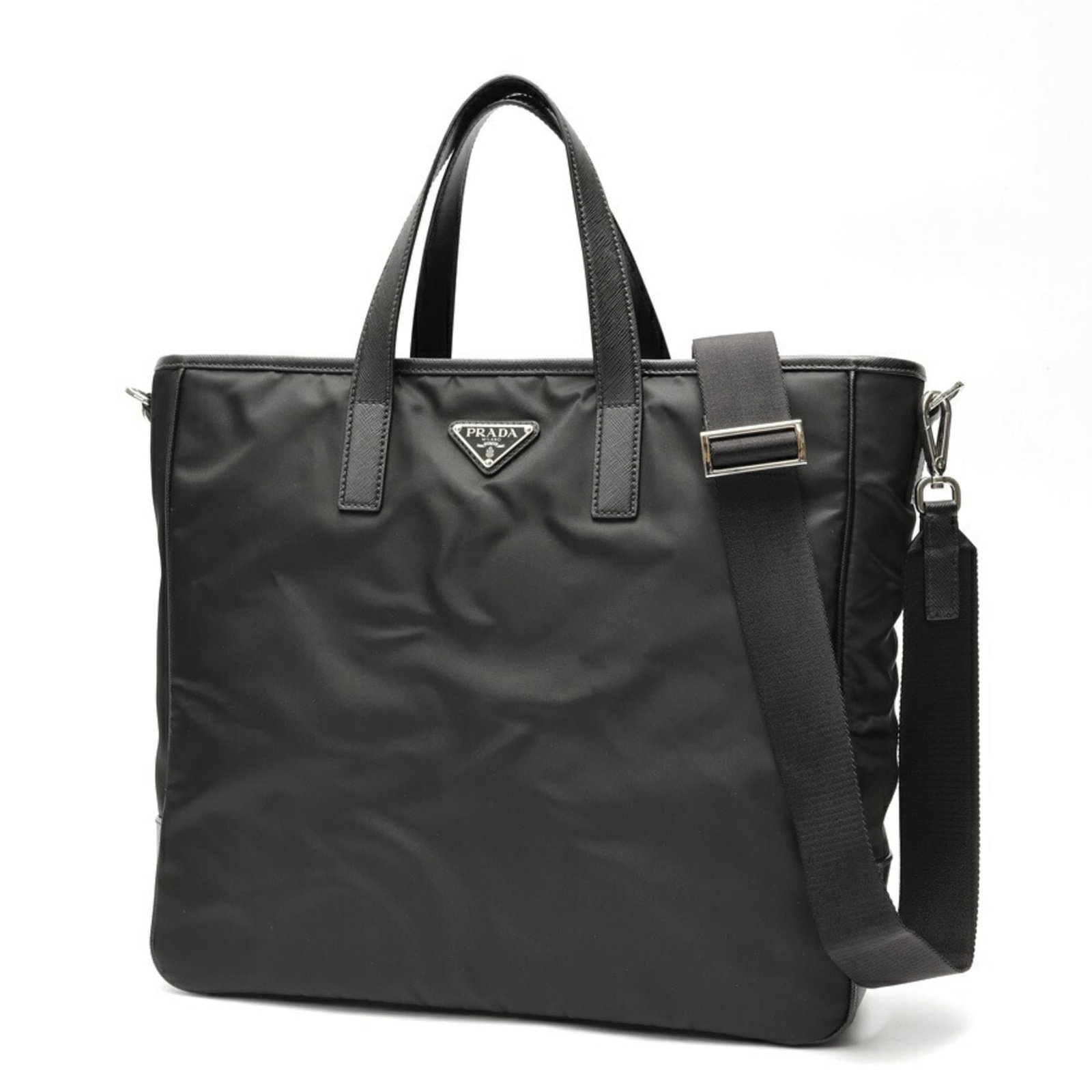 Prada Shoulder Bag Tote Bag Nylon Leather: Prada Shoulder Bag Tote Bag Nylon Leather Saffiano leather and nylon combine in this sleek, versatile shoulder bag tote from Prada. Measuring 33cm x 36cm x 10cm, it features a classic design with clea