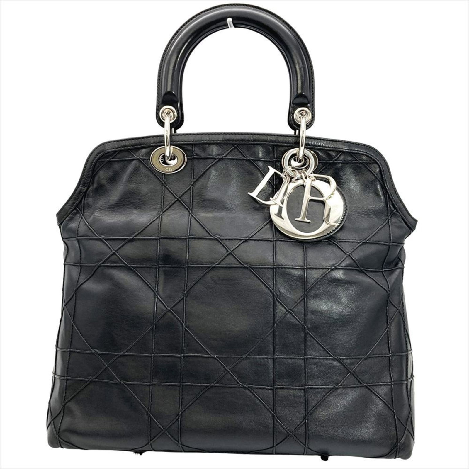 Handbag Christian Dior Leather: Handbag Christian Dior Leather The Christian Dior leather handbag boasts sleek lines and sophistication with its black color, Italian origin, and premium leather material. Measuring 29cm x 35cm x 16cm