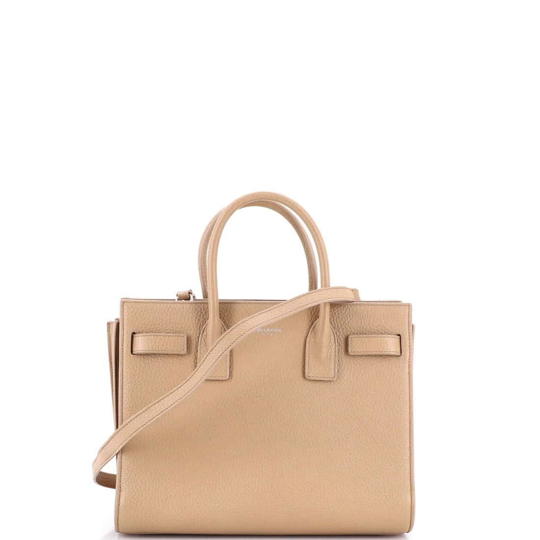 Sac de Jour Leather Baby Bag NM Saint Laurent: Sac de Jour Leather Baby Bag NM Saint Laurent Sac de Jour Leather Baby Bag in Neutral Color. This Saint Laurent tote features neutral leather exterior, black fabric interior, and silver hardware. Mino