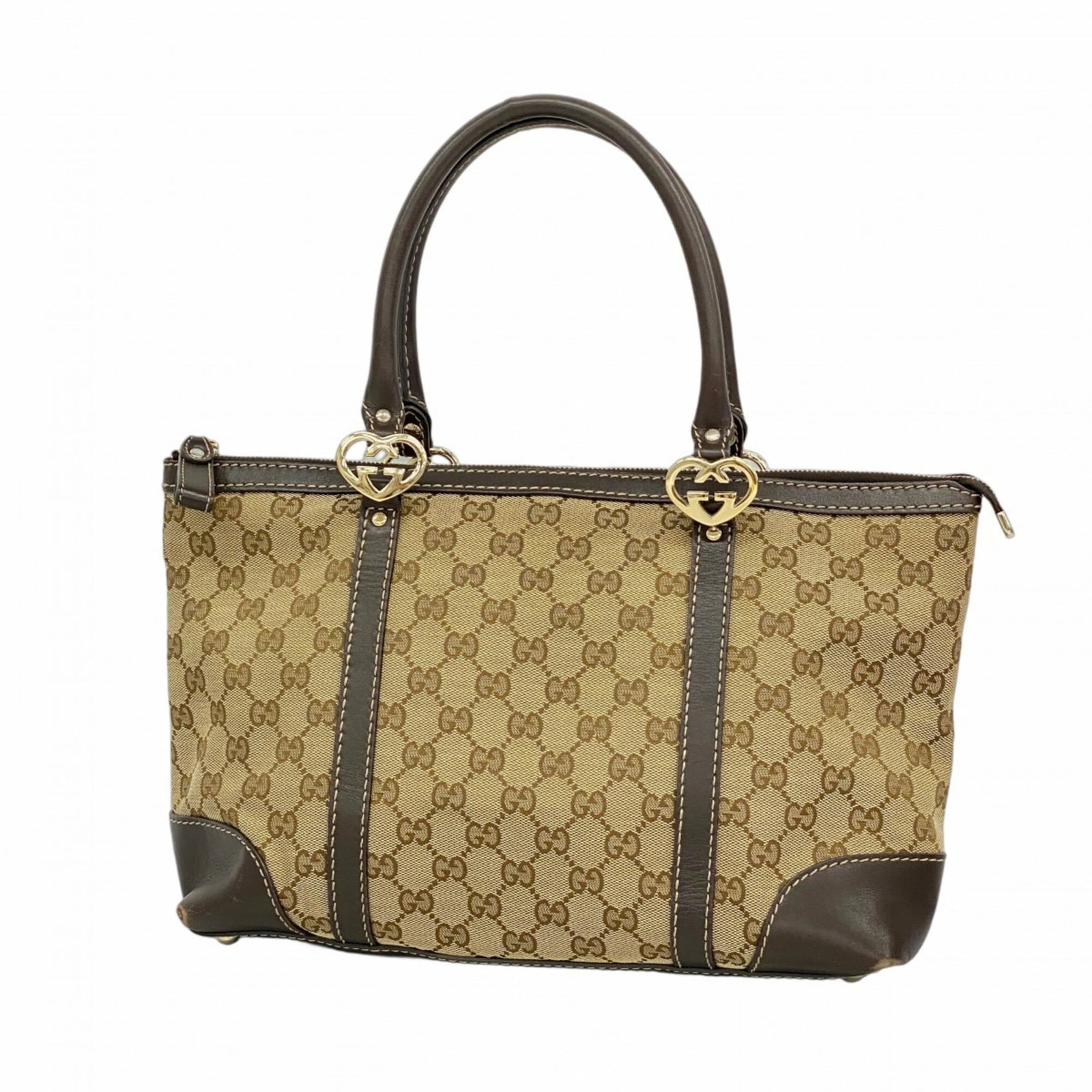 Canvas bag tote Gucci: Canvas bag tote Gucci Canvas bag tote Gucci in rich brown canvas, adorned with elegant champagne gold hardware. This stylish and spacious tote measures 21.5cm x 31.5cm x 13cm, perfect for daily essent