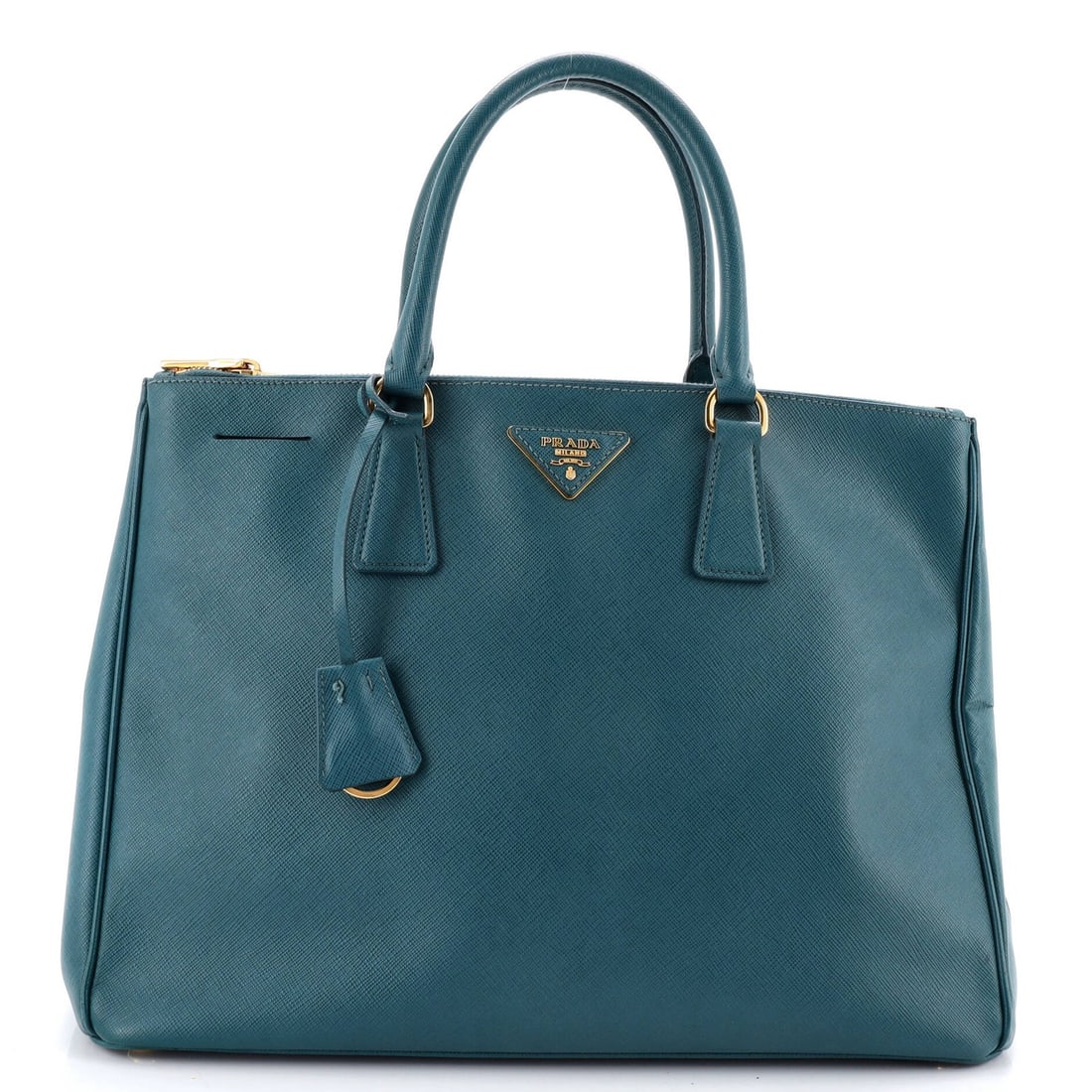 Saffiano Leather Double Lux Tote Large Prada: Saffiano Leather Double Lux Tote Large Prada Saffiano Leather Double Lux Tote Large Prada features a stunning blue exterior with heavy edge wear, creases, cracking, and minor scuffs. This large tote b