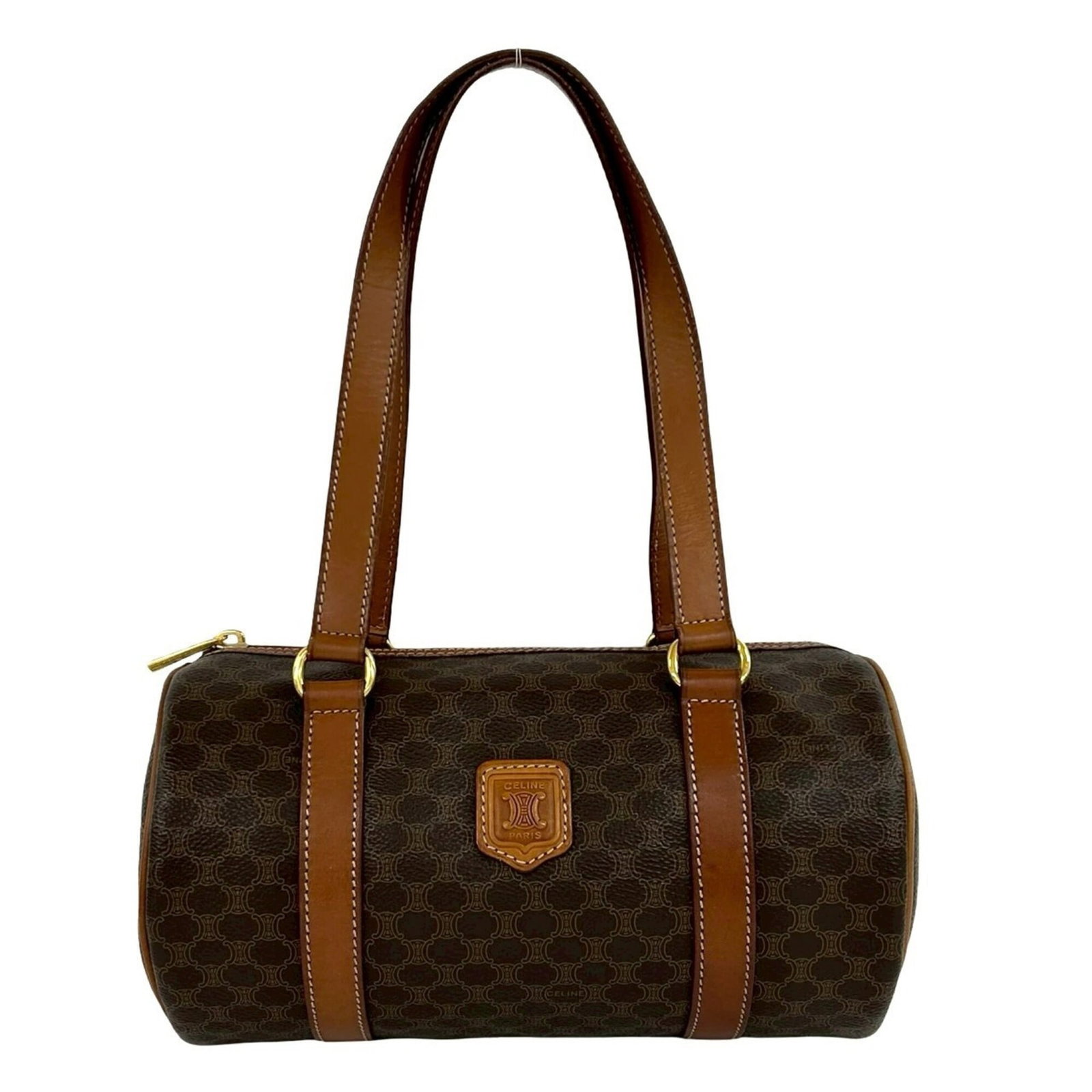 Boston bag pvc leather handbag: Boston bag pvc leather handbag Boston bag with PVC and leather construction, available in brown color. This handbag measures 13cm x 25cm x 13cm. The item bears a signature. Item Specifics: Brand: Celi