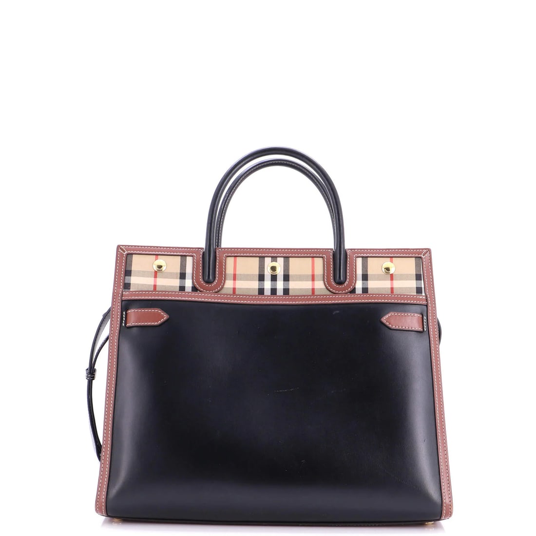 Medium canvas tote leather handle with vintage check two: Medium canvas tote leather handle with vintage check two Black canvas tote with vintage check leather handle, featuring a medium size and gold hardware. The exterior shows heavy scuffs on the base