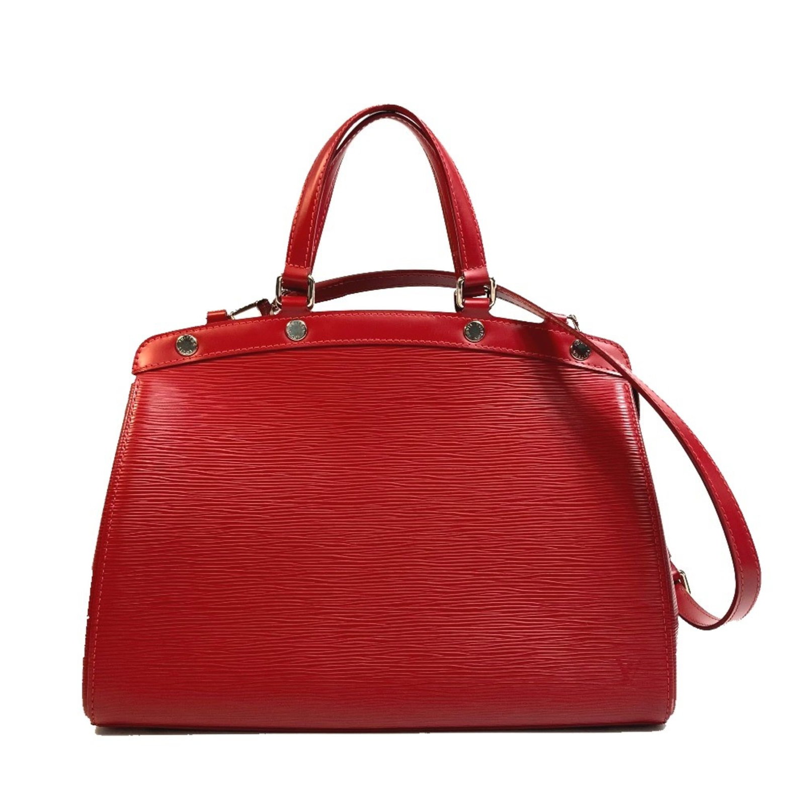 Handbag Louis Vuitton Leather: Handbag Louis Vuitton Leather Red Louis Vuitton Leather Handbag with Signature. This iconic handbag features a striking red color and measures 24cm x33cm x12.5cm, making it a stylish accessory for