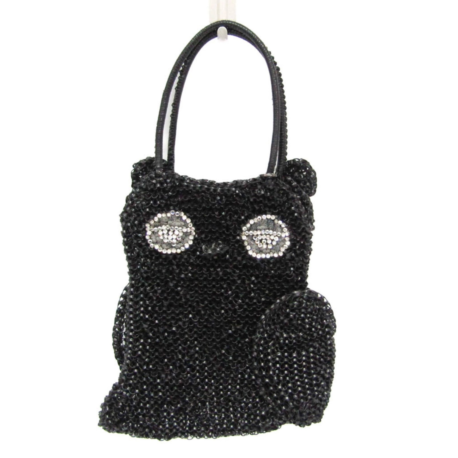 Anteprima Handbag Wire Rhinestone: Anteprima Handbag Wire Rhinestone Wire rhinestone embellishments add a touch of glamour to this sleek black Anteprima handbag, featuring gunmetal hardware and an owl-inspired design. The open closure 