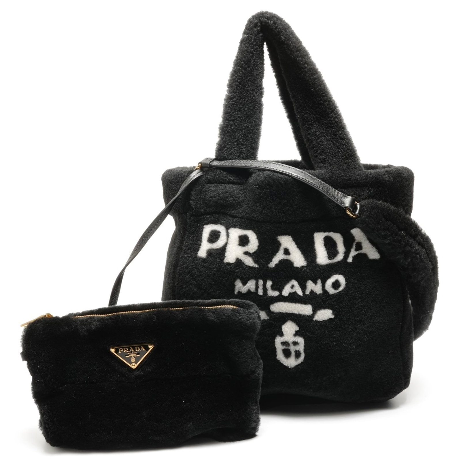 Fur Prada: Fur Prada The Prada fur handbag boasts sleek lines and sophisticated style, with its black fur exterior and sturdy 80cm strap for effortless carrying. Measuring just 25cm in height, this compact bag i