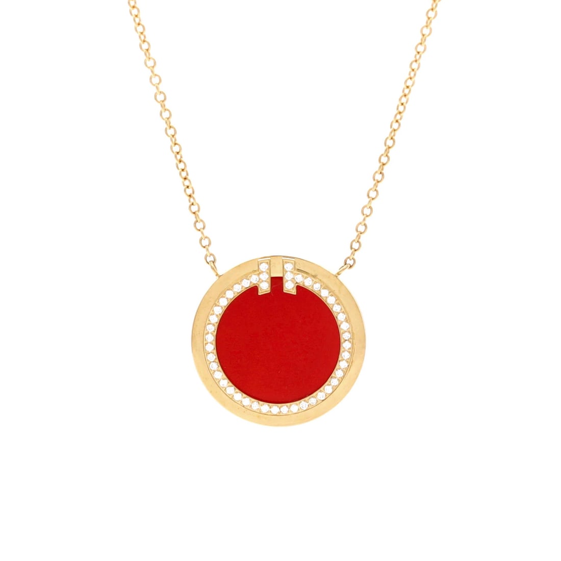 Tiffany Co T Circle Pendant Necklace 18K Yellow Gold Carnelian: Tiffany Co T Circle Pendant Necklace 18K Yellow Gold Carnelian Tiffany & Co's iconic T Circle Pendant Necklace boasts elegance with its 18K yellow gold setting, featuring a vibrant carnelian stone and