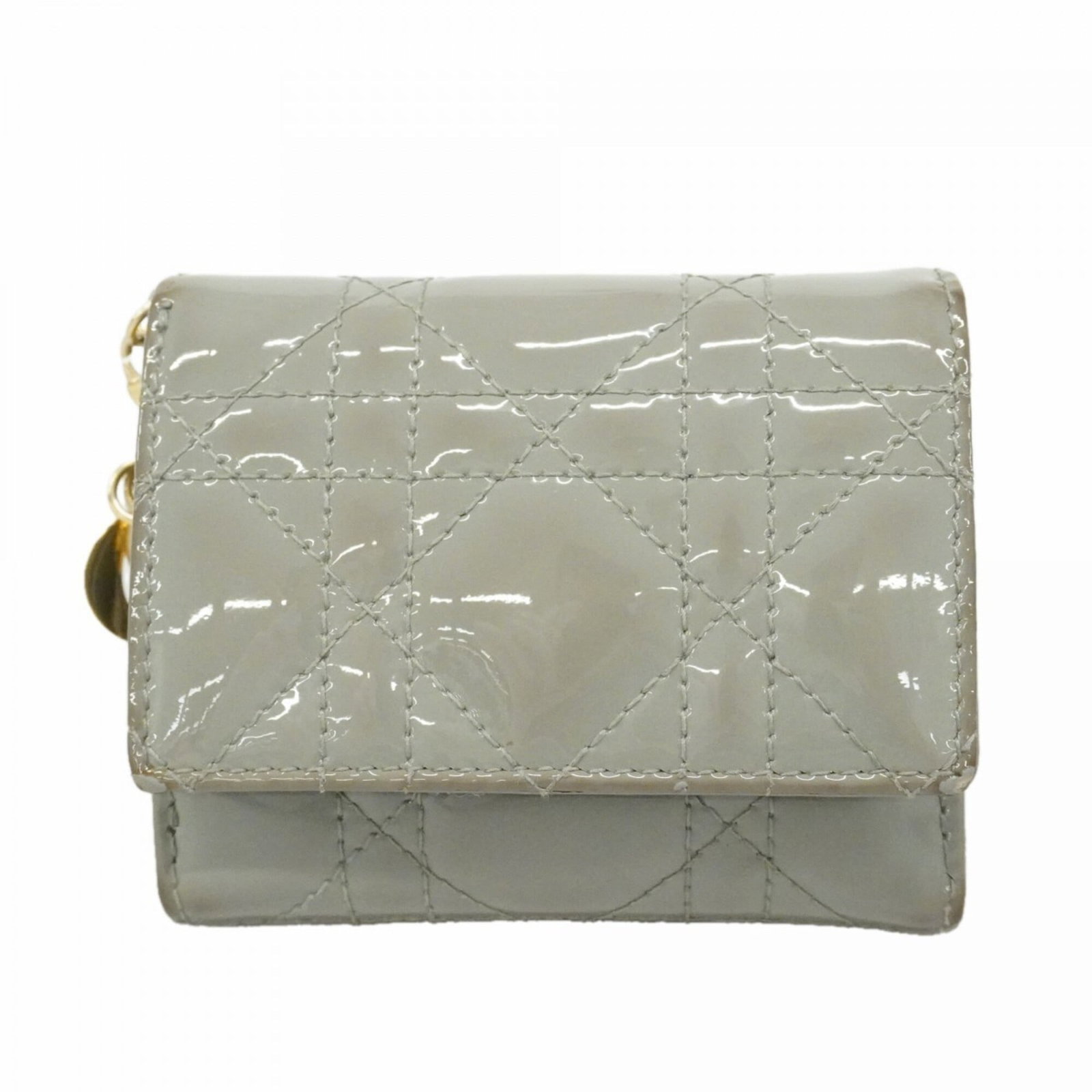 Dior Wallet Tri Fold: Dior Wallet Tri Fold The Dior Wallet Tri Fold boasts sleek, gray design with clean lines and a compact size. Made from high-quality materials, its tri-fold structure provides ample space for cards and