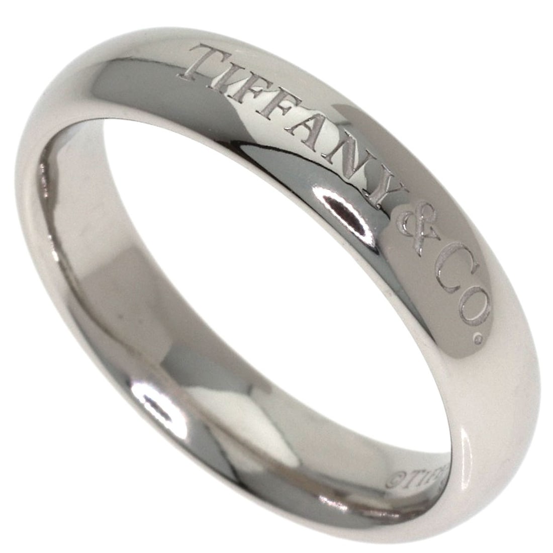 Tiffany&Co. T&Co Band #50 Ring Platinum Pt950: Tiffany&Co. T&Co Band #50 Ring Platinum Pt950 Tiffany&Co.'s T&Co Band #50 Ring showcases sleek, silver platinum construction. This platinum Pt950 ring features no main stone and a sizeable band that f