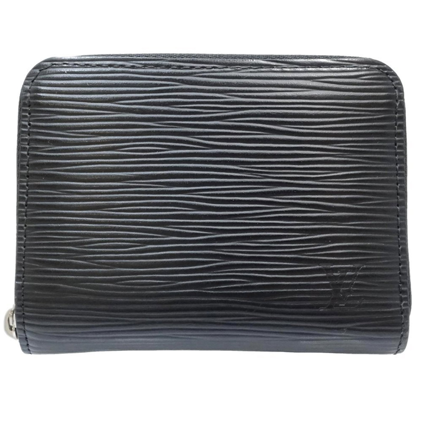 Louis Vuitton Coin Purse/ Coin Case Leather: Louis Vuitton Coin Purse/ Coin Case Leather The Louis Vuitton Coin Purse/ Coin Case Leather is a sleek and stylish accessory, featuring the iconic Epi model with a signature. Made from high-quality le