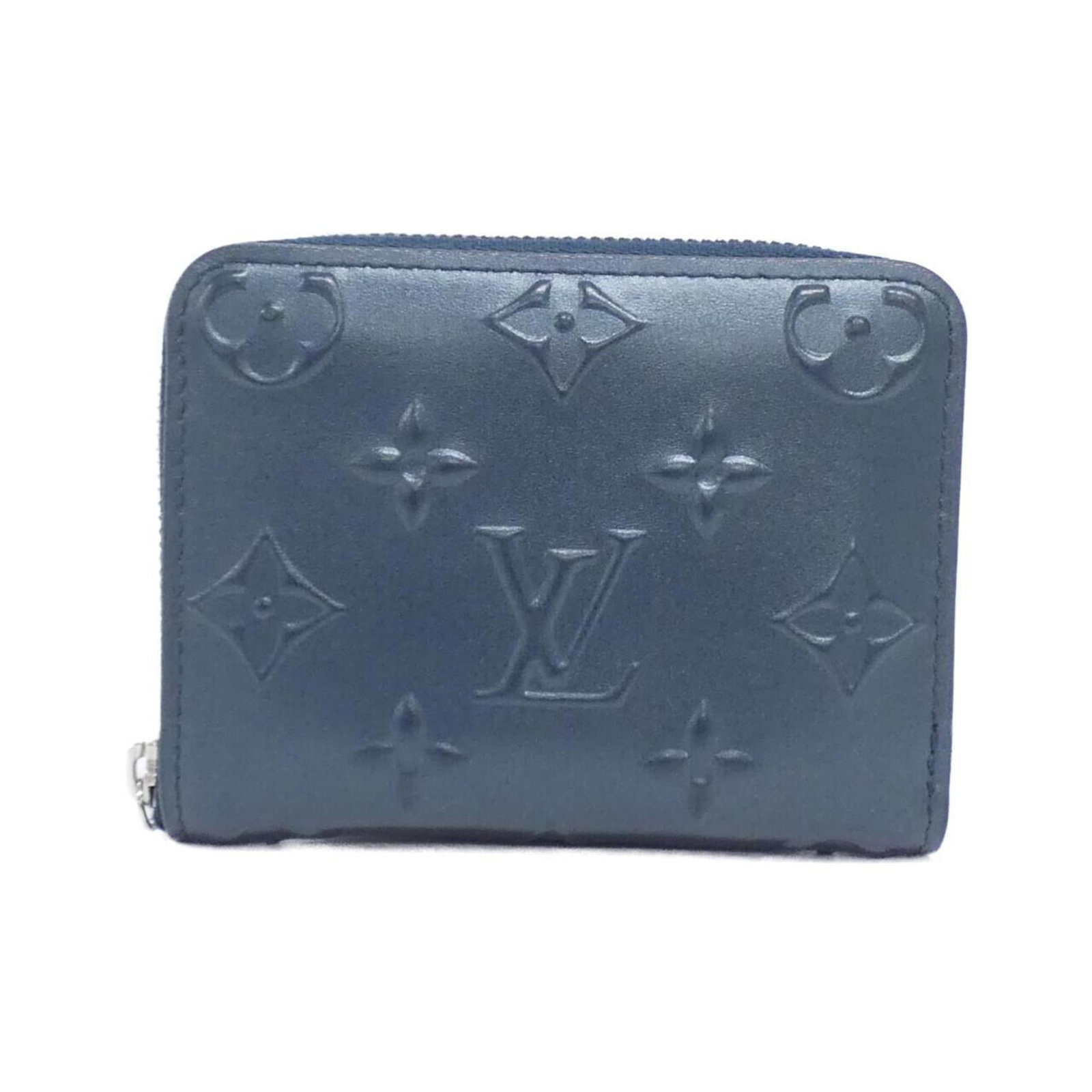 Louis Vuitton Coin Purse/ Coin Case Leather: Louis Vuitton Coin Purse/ Coin Case Leather Blue Louis Vuitton Coin Purse/ Coin Case Leather, made from high-quality Calf leather, features a classic design with a signature touch. The compact size an