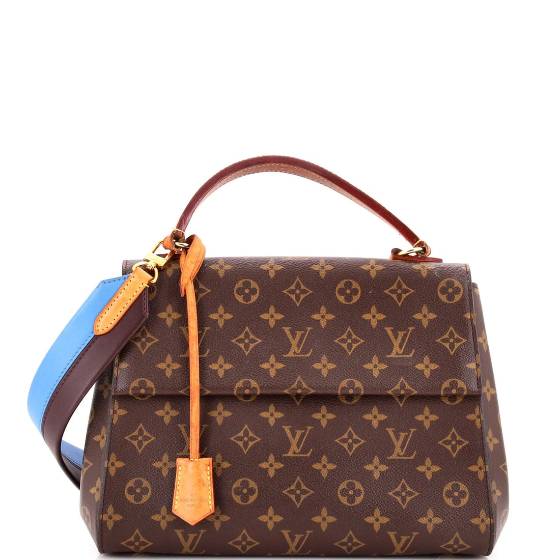 Top handle bag monogram canvas bag with louis vuitton cluny MM: Top handle bag monogram canvas bag with louis vuitton cluny MM Canvas coated Louis Vuitton Cluny MM top handle bag with brown and blue exterior colors, featuring the iconic monogram pattern. The bag m