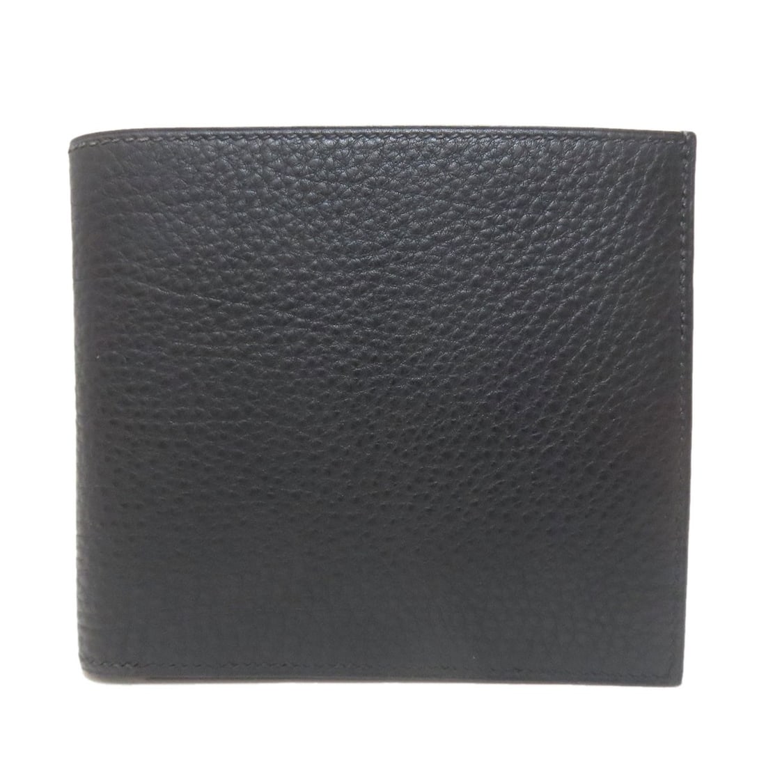 Hermes Mc2 Copernicus Bifold Wallet No Coin Pocket Calf: Hermes Mc2 Copernicus Bifold Wallet No Coin Pocket Calf Black Calf Bifold Wallet with No Coin Pocket from Hermes Mc2 Copernicus Collection. This sleek, black calf leather bifold wallet features a clas