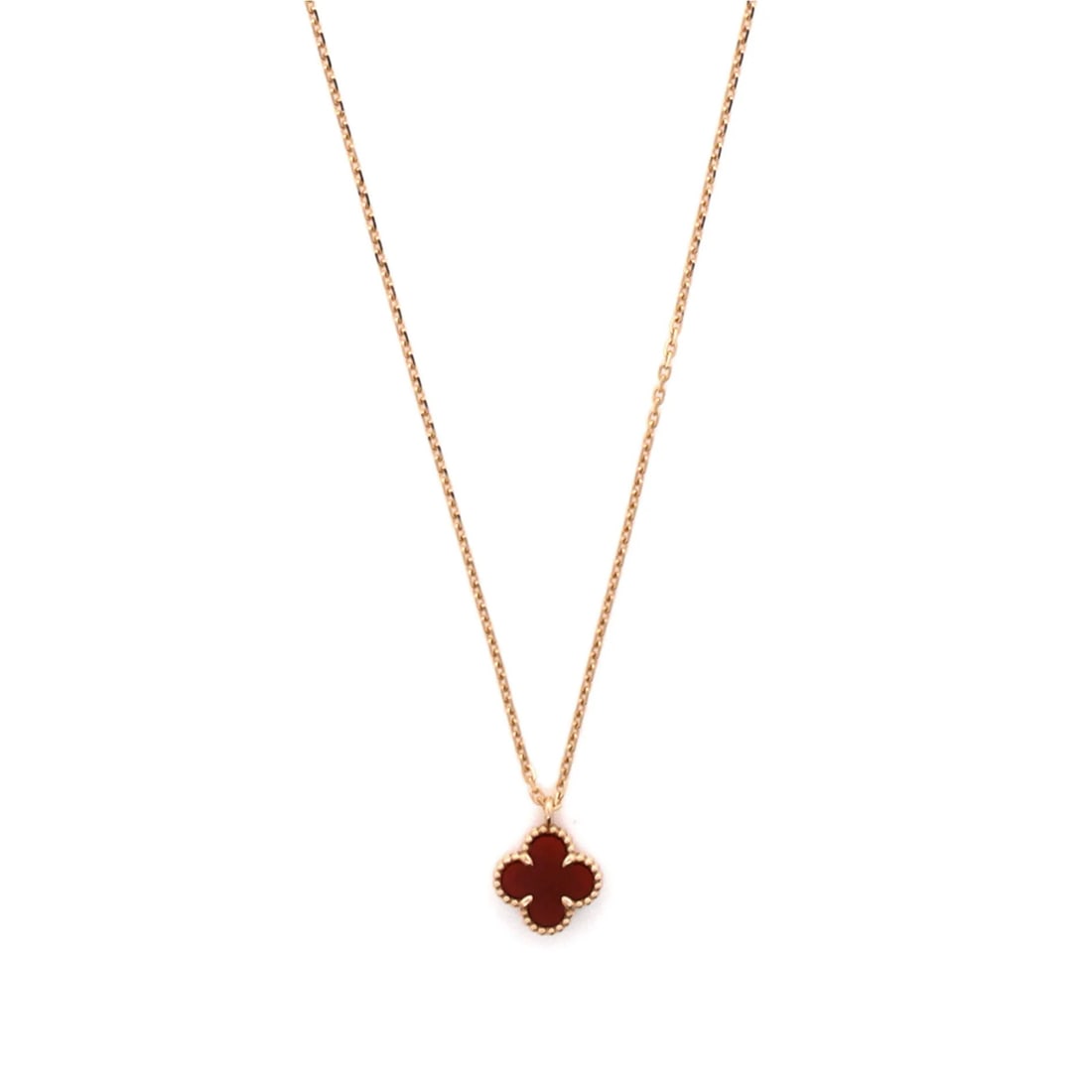 Sweet Alhambra Pendant Necklace 18K Rose Gold Carnelian Van Cleef Arpels: Sweet Alhambra Pendant Necklace 18K Rose Gold Carnelian Van Cleef Arpels The Sweet Alhambra Pendant Necklace in 18K rose gold and featuring a vibrant carnelian stone is a stunning piece of jewelry. Wi