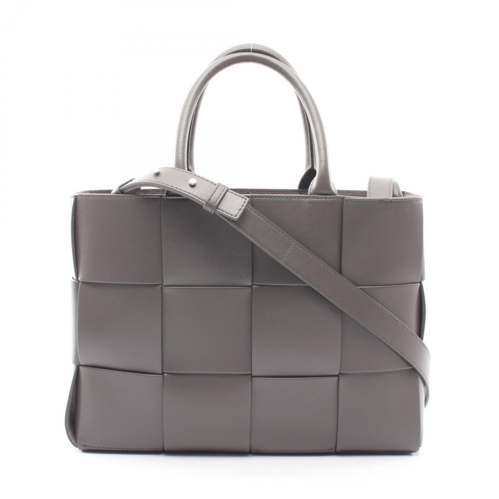 Veneta Leather Tote Bag Handbag: Veneta Leather Tote Bag Handbag Bottega Veneta's iconic leather tote bag features a sleek gray color and classic design. Made from high-quality leather, this timeless handbag measures 24cm x 33cm x 9c