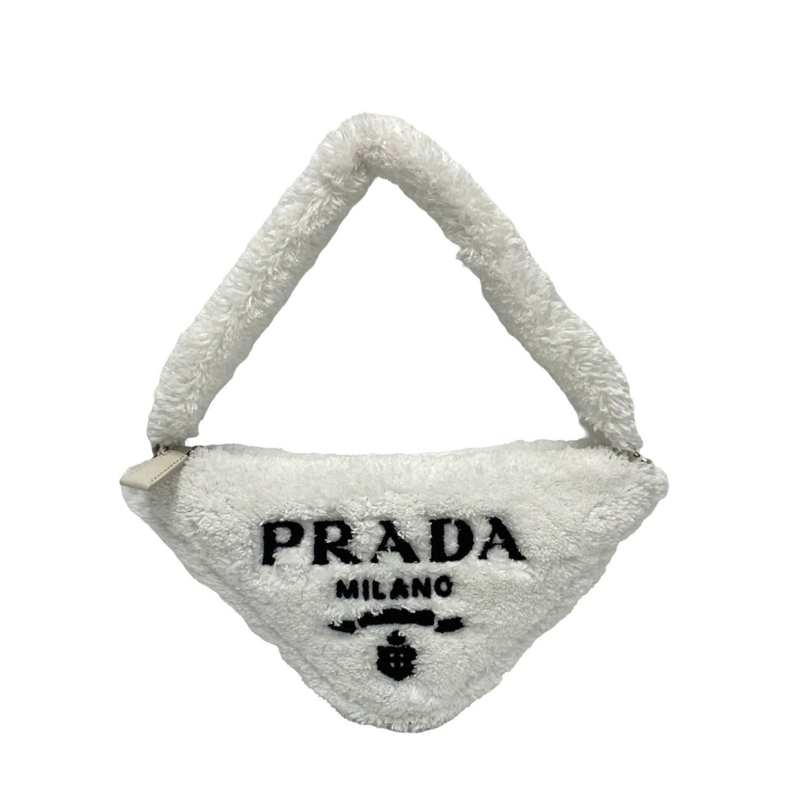 Fabric pile handbag: Fabric pile handbag White pile fabric, a unique and eye-catching material, is used to create this stylish handbag. The bag's compact size and manual dust bag make it easy to carry and store. A matchin