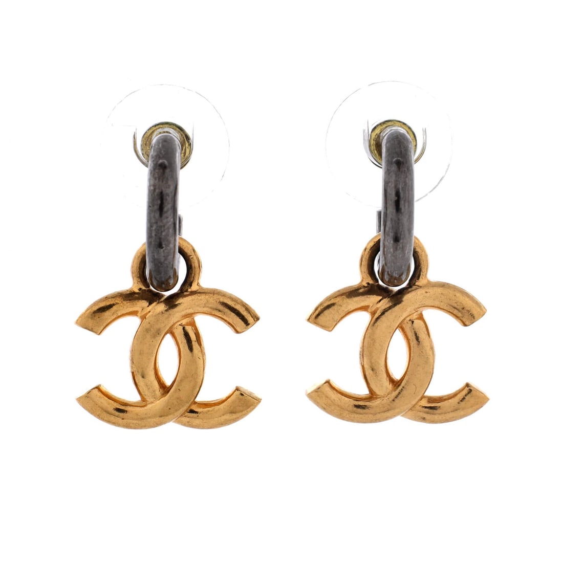 Chanel CC Hoop Dangle Earrings Metal: Chanel CC Hoop Dangle Earrings Metal Chanel's CC Hoop Dangle Earrings Metal are a stylish accessory featuring gold metal and a unique design. With their distinctive shape and size, these earrings add 