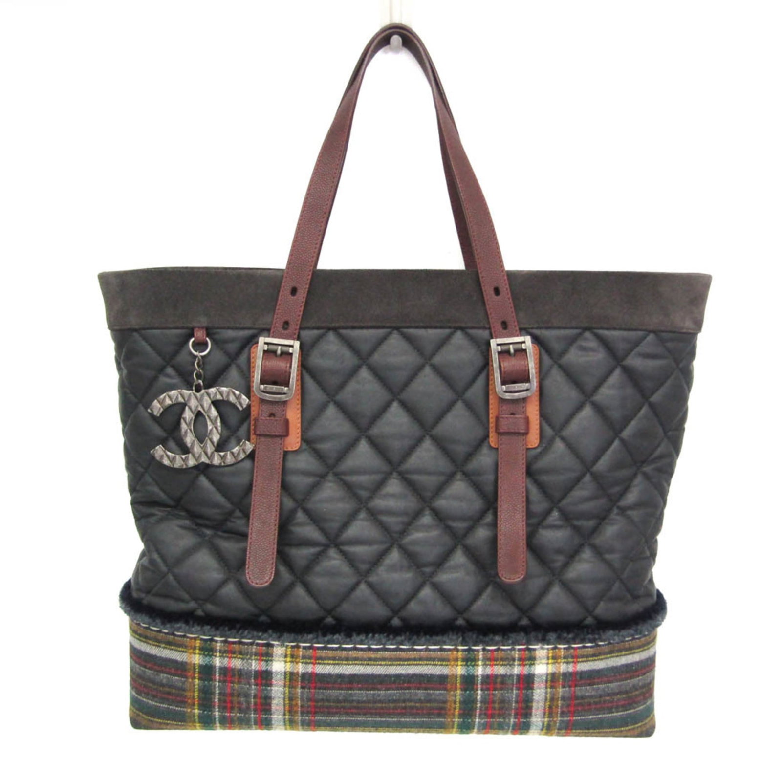 Leather Suede Tweed Canvas Coated Chanel Tote Bag: Leather Suede Tweed Canvas Coated Chanel Tote Bag Black, Brown, Green Leather Suede Tweed Canvas Coated Chanel Tote Bag features a unique blend of luxurious materials, including leather, suede, and