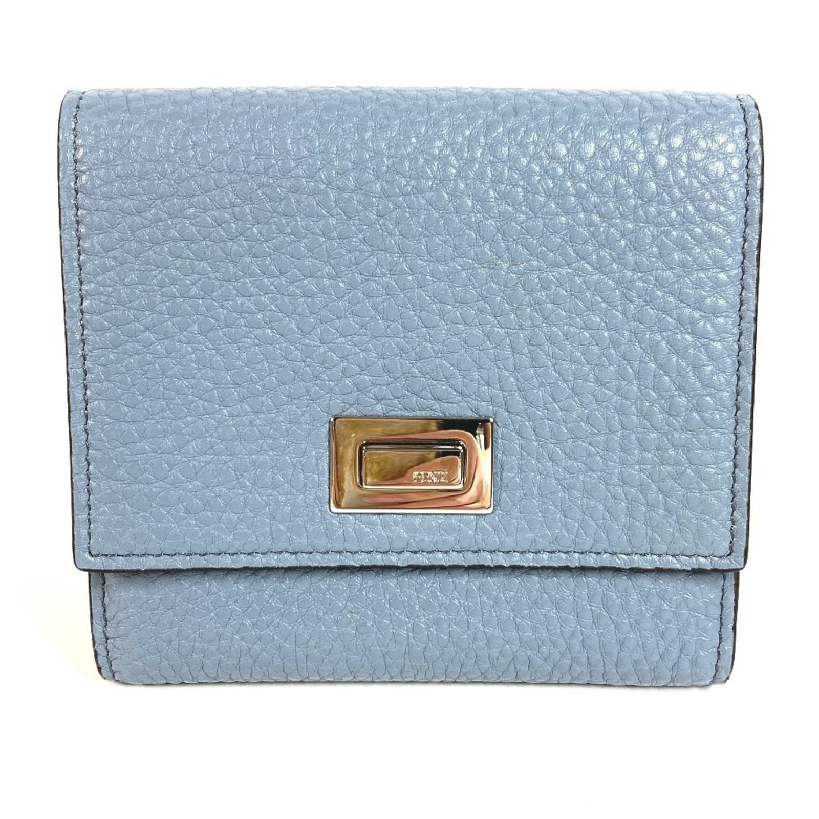 Fendi Wallet (Bi-Fold) Leather: Fendi Wallet (Bi-Fold) Leather Fendi's bi-fold leather wallet boasts sleek, modern design with a striking blue hue. Made from high-quality Italian leather, its compact size (11cm x 12cm) makes it perf