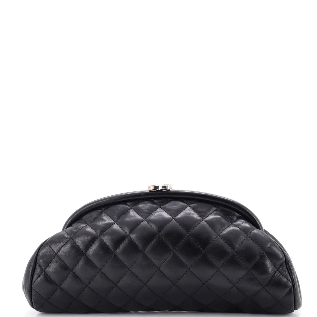 Quilted lambskin clutch by timeless Chanel: Quilted lambskin clutch by timeless Chanel This timeless Chanel Timeless Clutch features a quilted lambskin exterior in black leather, with intricate stitching and silver hardware. The clutch measures