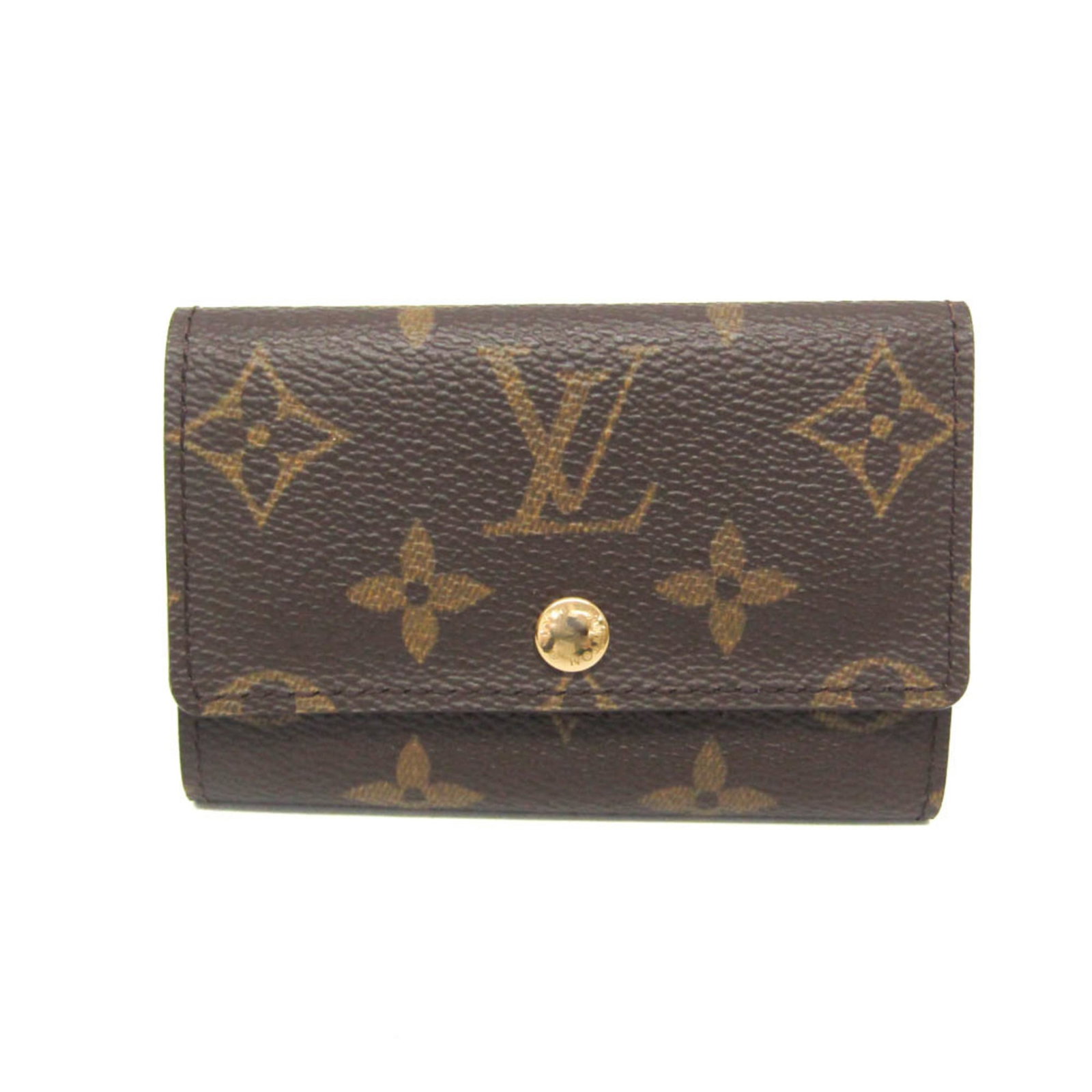 Keycase Monogram Louis Vuitton: Keycase Monogram Louis Vuitton The Louis Vuitton Monogram Keycase is a stylish and functional accessory, featuring the iconic monogram pattern in rich brown leather. With six secure key hooks, it's pe