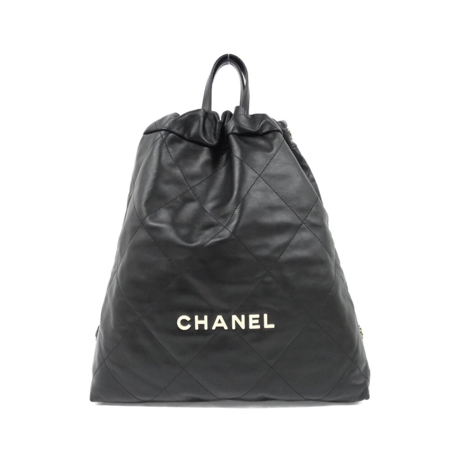 Leather Backpack by Chanel: Leather Backpack by Chanel Black leather backpack by Chanel, featuring calfskin material and matte gold hardware. This stylish bag measures 40cm x 35cm x 8cm and weighs 760g, with adjustable strap len