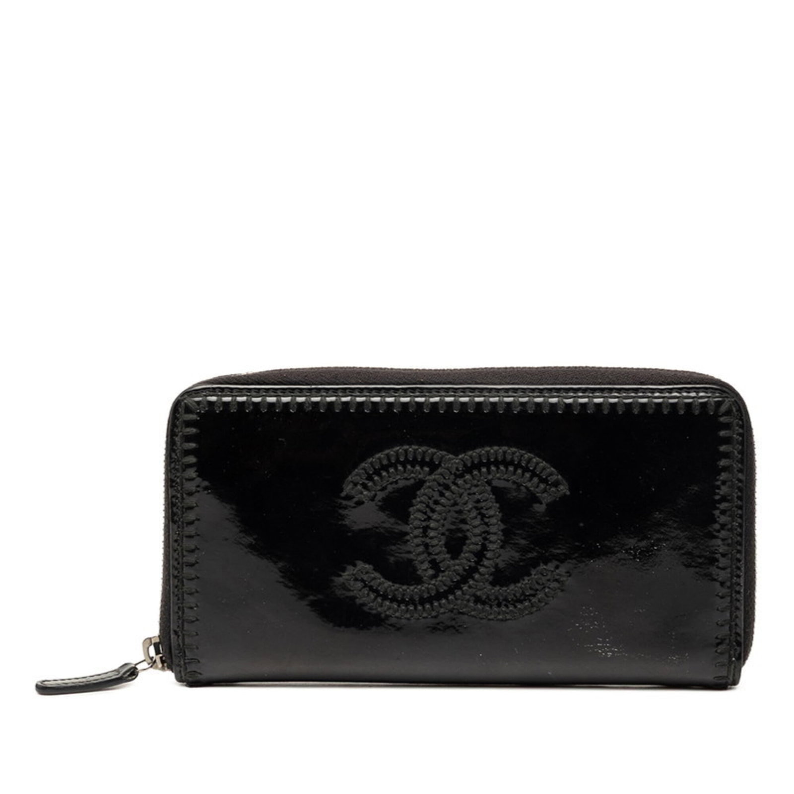 Patent leather bi fold wallet by Chanel: Patent leather bi fold wallet by Chanel Patent leather bi-fold wallet by Chanel features sleek black design and zipper closure, measuring 10.5cm x 19cm x 2cm. The patent leather material gives the wal