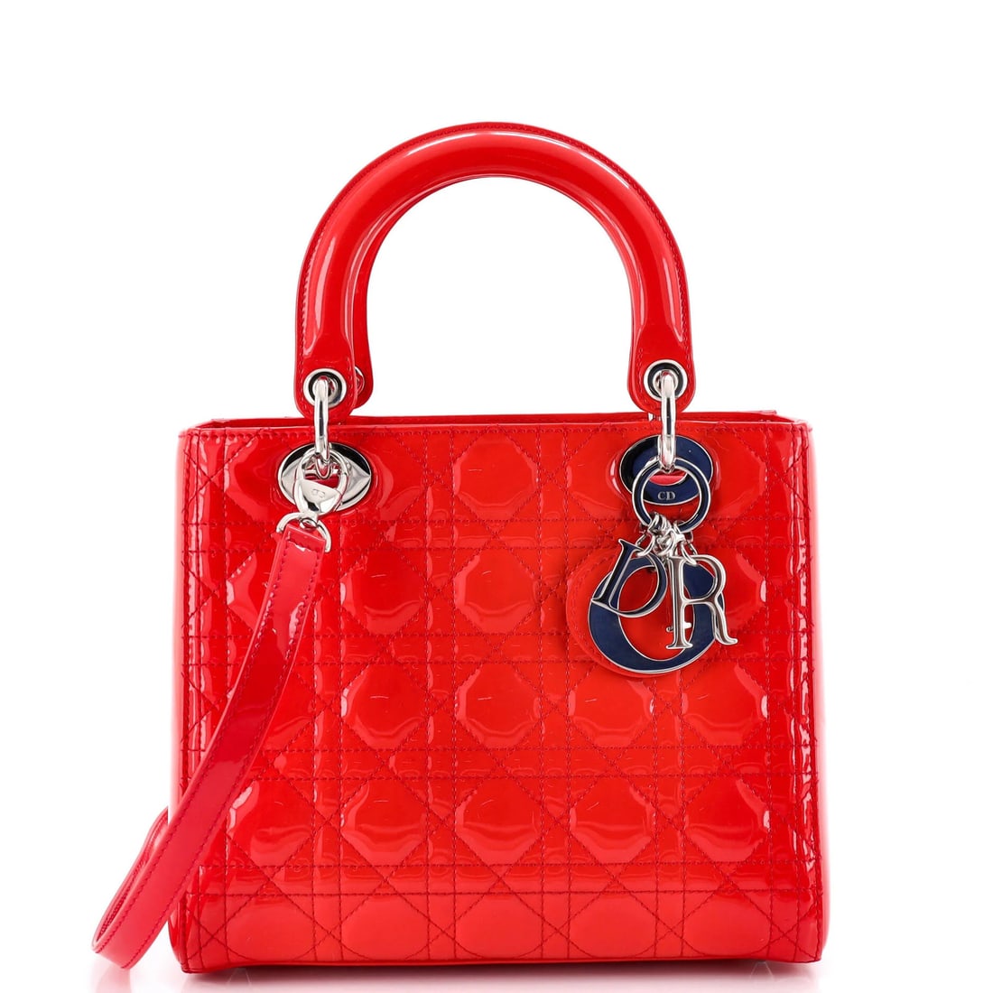 Patent quilt cannage medium lady bag Dior Christian: Patent quilt cannage medium lady bag Dior Christian Patent quilt cannage medium lady bag from Christian Dior, featuring patent leather exterior in red and interior in matching fabric. The bag boasts a