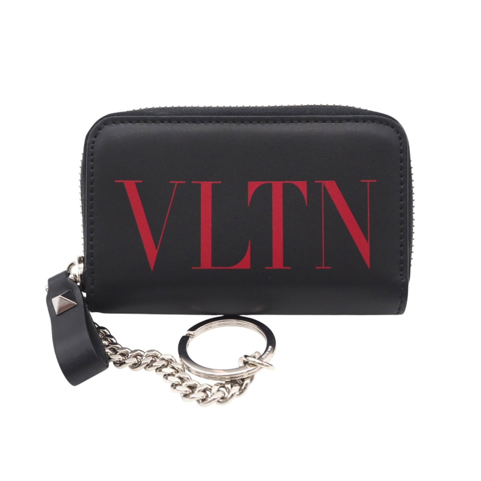 Valentino Coin Purse/ Coin Case Leather: Valentino Coin Purse/ Coin Case Leather Black and red leather coin purse/coin case from Valentino, featuring a zipper closure. Made from high-quality leather, this compact accessory measures 7cm x 11c