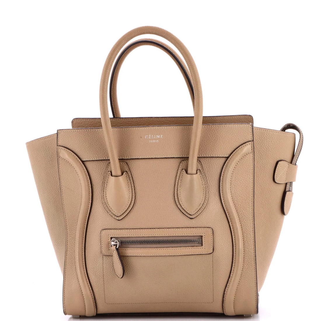 Celine Luggage Bag Grainy Leather Micro: Celine Luggage Bag Grainy Leather Micro The Celine Luggage Bag Grainy Leather Micro features a neutral exterior with creases and corner wear, complemented by cracking handles and straps. With its