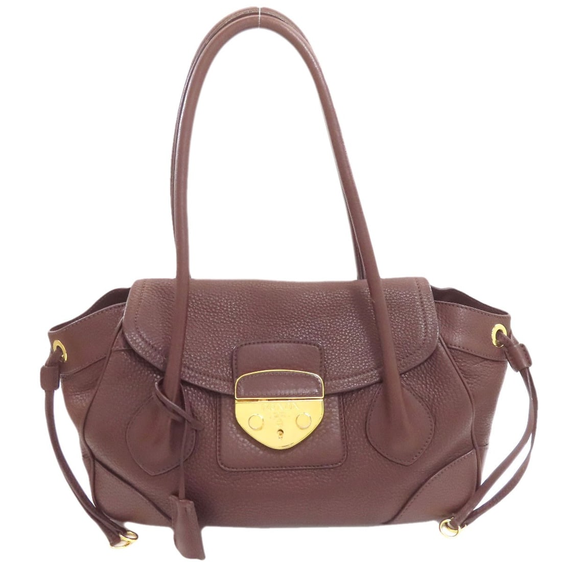 Prada Br3116 Logo Tote Bag Leather: Prada Br3116 Logo Tote Bag Leather Brown leather Prada Br3116 Logo Tote Bag, featuring the iconic logo on its exterior. Made from high-quality leather, this tote bag boasts a classic design that exude