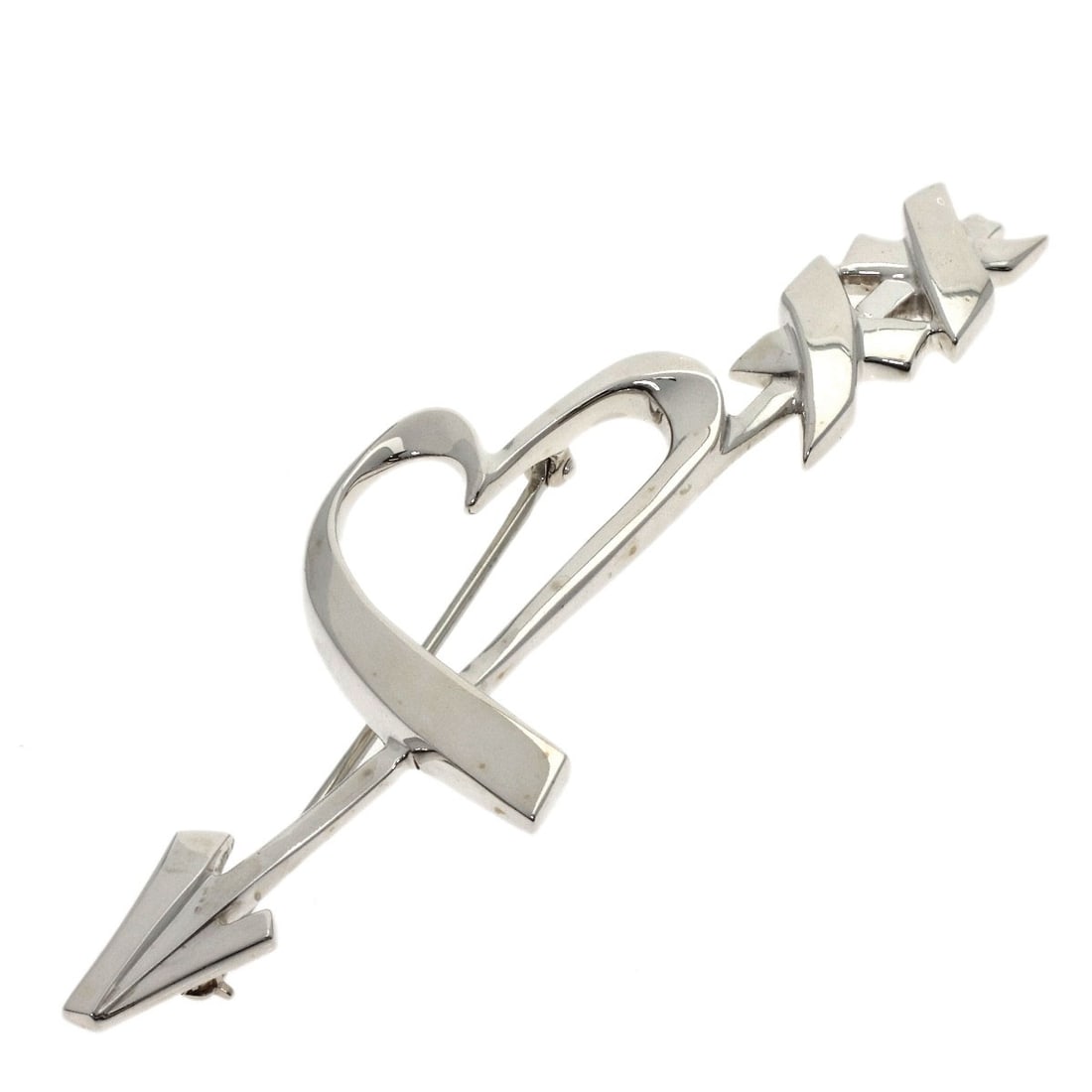 Tiffany Co Heart Arrow Silver: Tiffany Co Heart Arrow Silver Silver Tiffany Co Heart Arrow Brooch. This brooch features a striking silver design with a heart and arrow motif, showcasing the iconic style of Tiffany & Co. The intrica