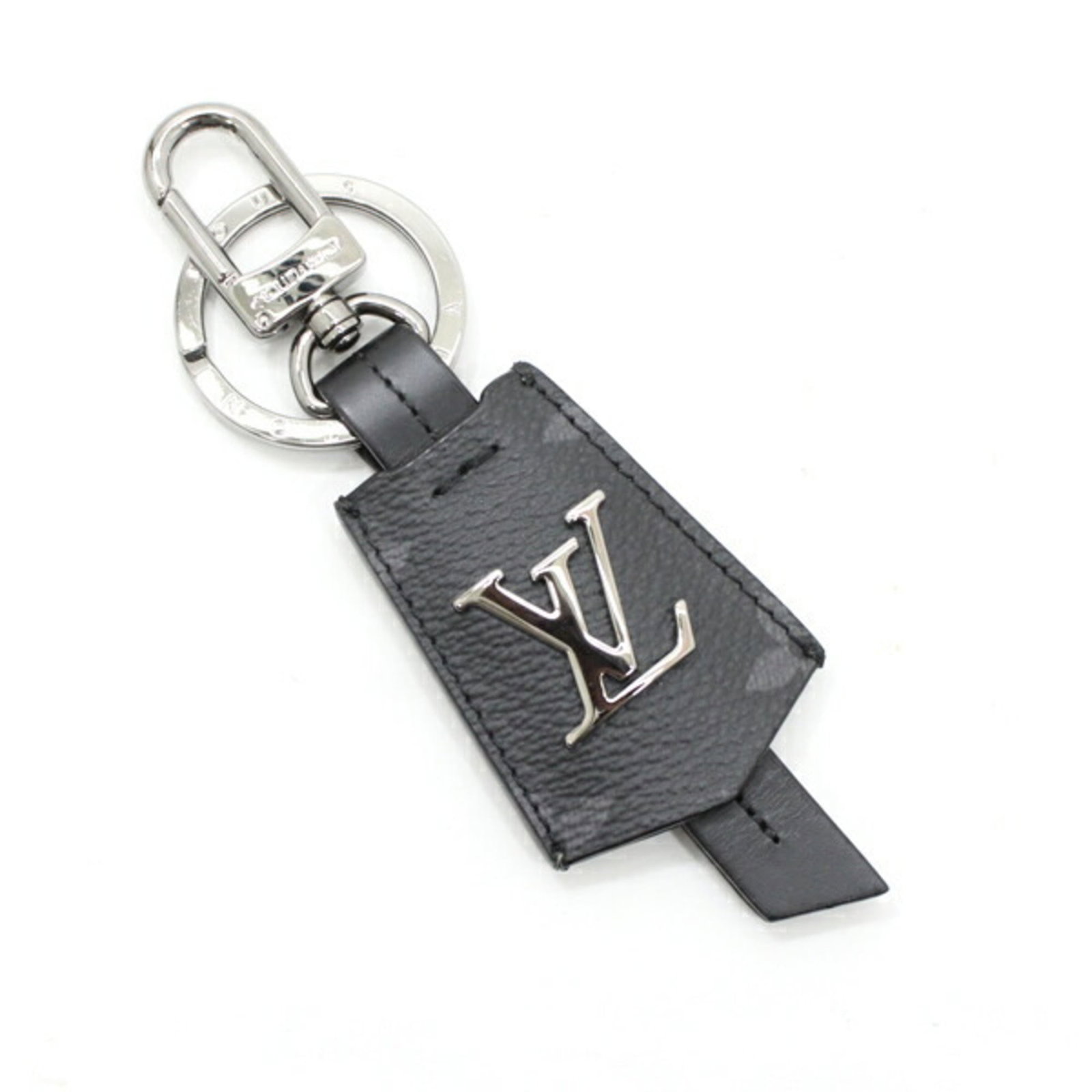 Keyring with Monogram Eclipse from Louis Vuitton: Keyring with Monogram Eclipse from Louis Vuitton Monogram Eclipse keyring from Louis Vuitton, featuring the iconic black monogram pattern. This sleek accessory is presented in a luxurious box and dust