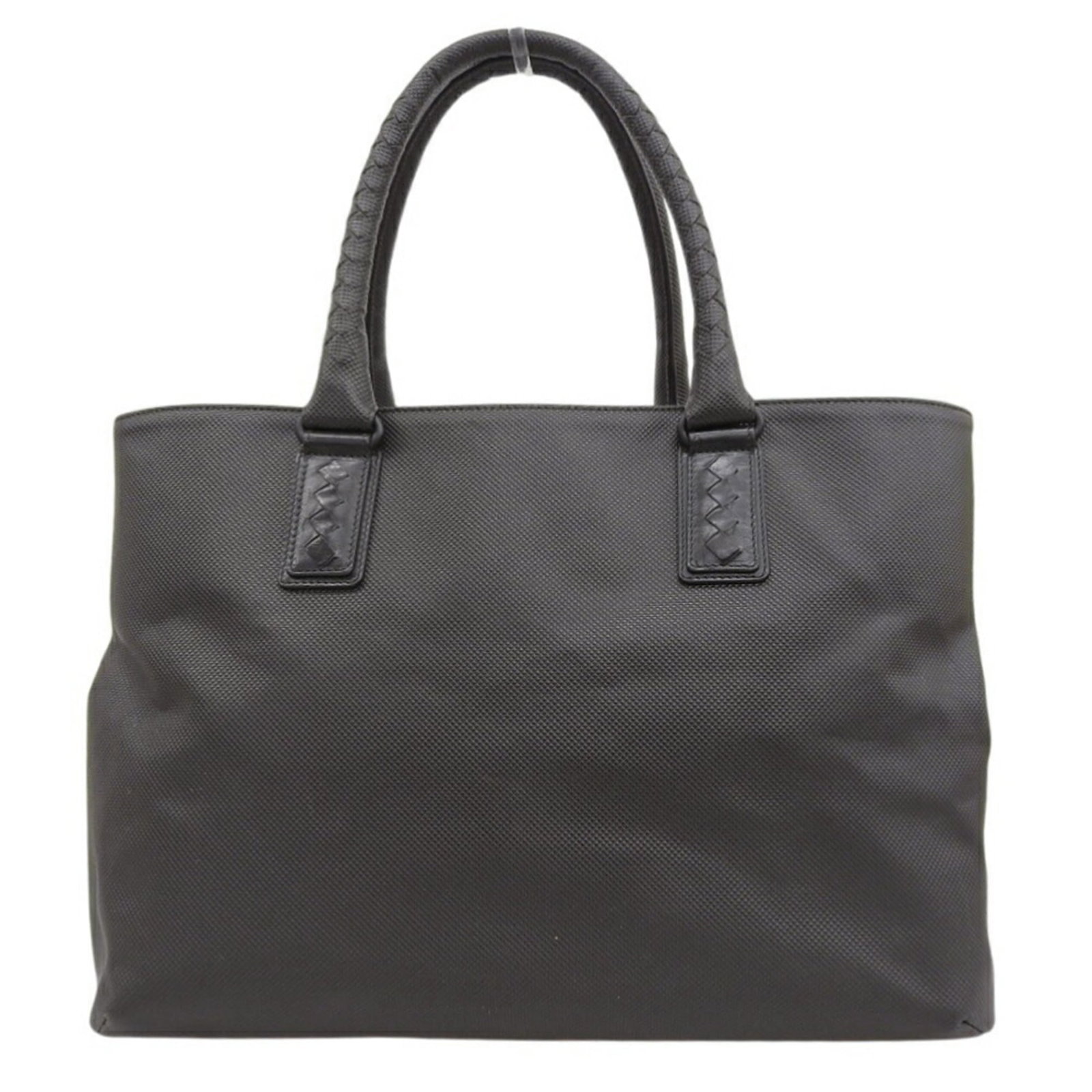 Pvc leather tote bag by Bottega Veneta: Pvc leather tote bag by Bottega Veneta Bottega Veneta's PVC leather tote bag boasts a sleek, dark brown design with clean lines and a classic silhouette. Made from high-quality materials, its durable 