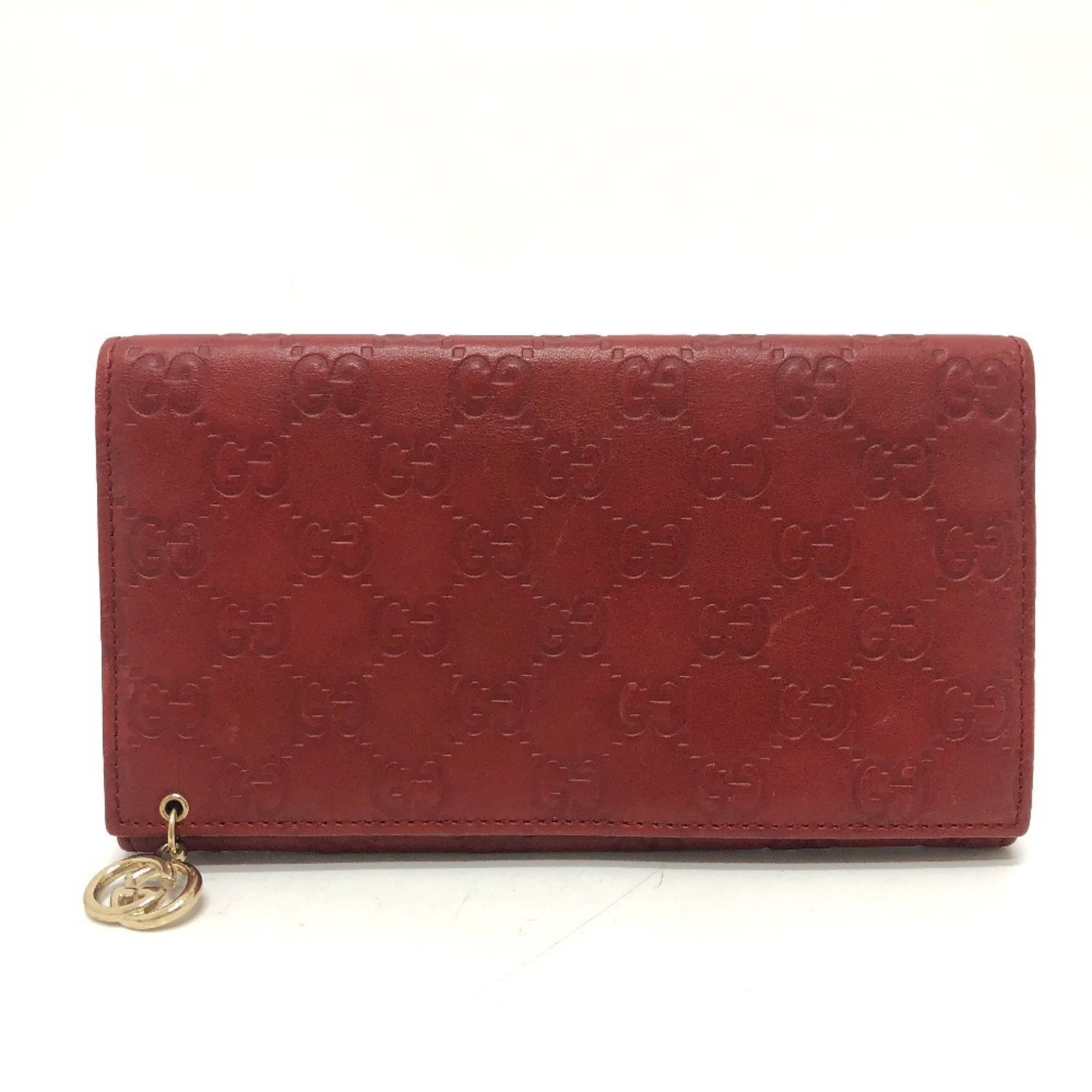 Gucci Long Wallet (Bi-Fold) Gg Leather: Gucci Long Wallet (Bi-Fold) Gg Leather The Gucci Long Wallet (Bi-Fold) features GG leather, a signature material known for its unique texture and durability. With its striking red color and compact si