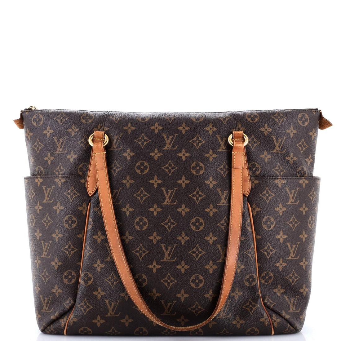 Handbag Canvas Monogram Louis Vuitton Totally: Handbag Canvas Monogram Louis Vuitton Totally Canvas Monogram Louis Vuitton Totally Handbag in Brown. This Louis Vuitton shoulder bag features a classic monogram canvas exterior with brown leather acc