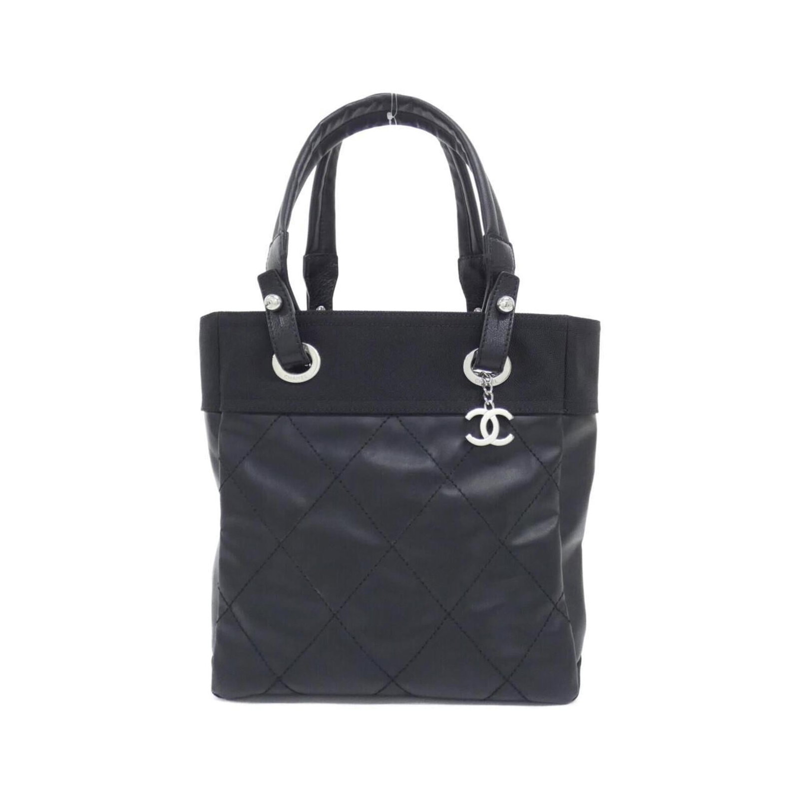 Chanel Handbag Canvas: Chanel Handbag Canvas Canvas handbag from Chanel, featuring black canvas material and dimensions of 27cm x 32cm x 10cm. This classic design showcases the iconic brand's signature style with clean