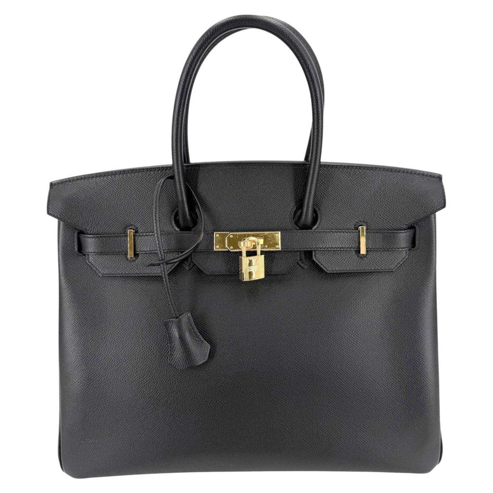 Hermes leather handbag: Hermes leather handbag Black leather handbag from Hermes, measuring 26cm x 34cm x 18cm. Features high-quality craftsmanship and attention to detail in its sleek design. A classic style piece made from