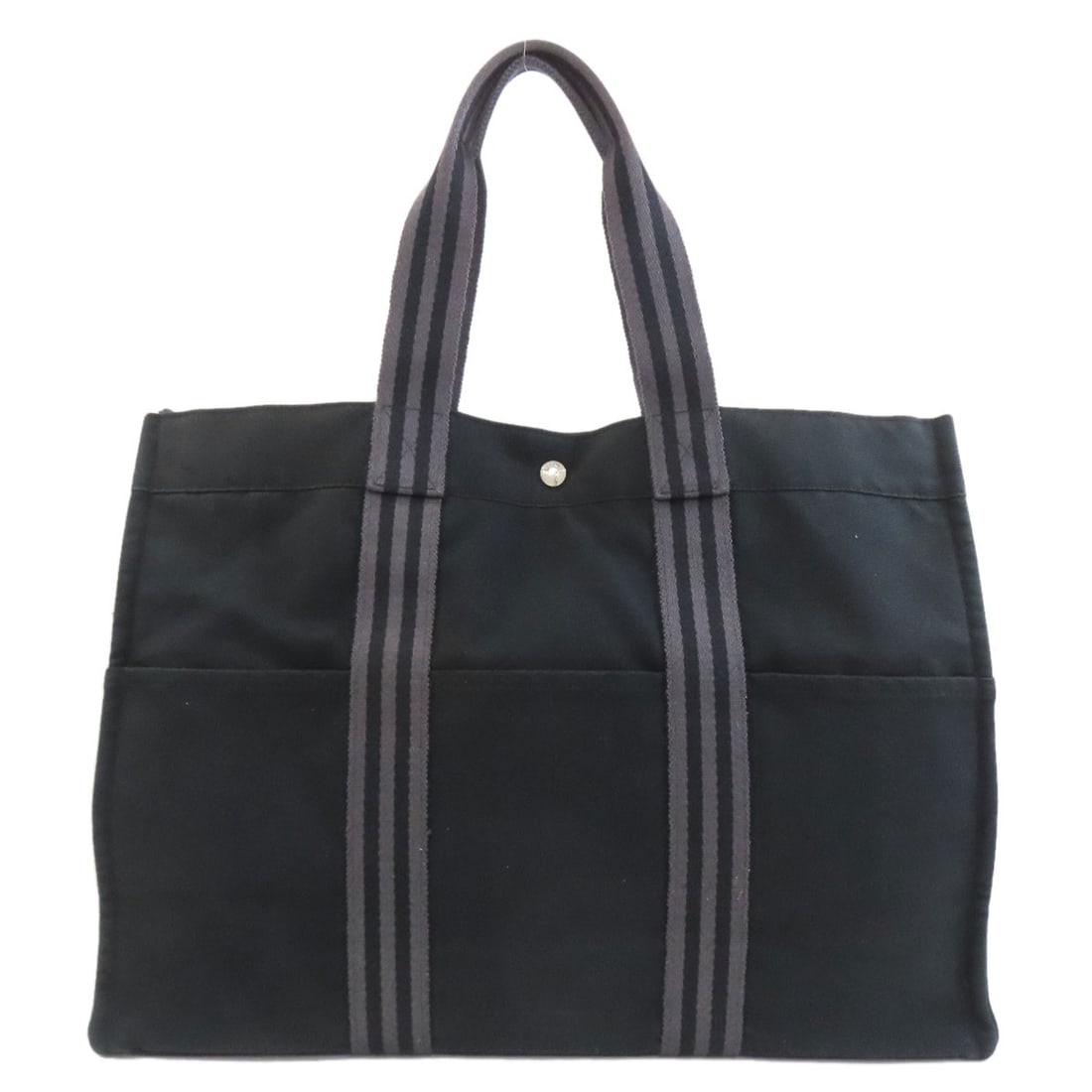 Canvas Tote Bag Toegm Sackfool Hermes: Canvas Tote Bag Toegm Sackfool Hermes Canvas tote bag with black exterior, made from canvas material. The bag's style is described as HERMES, indicating it mimics the iconic brand's aesthetic. A notab