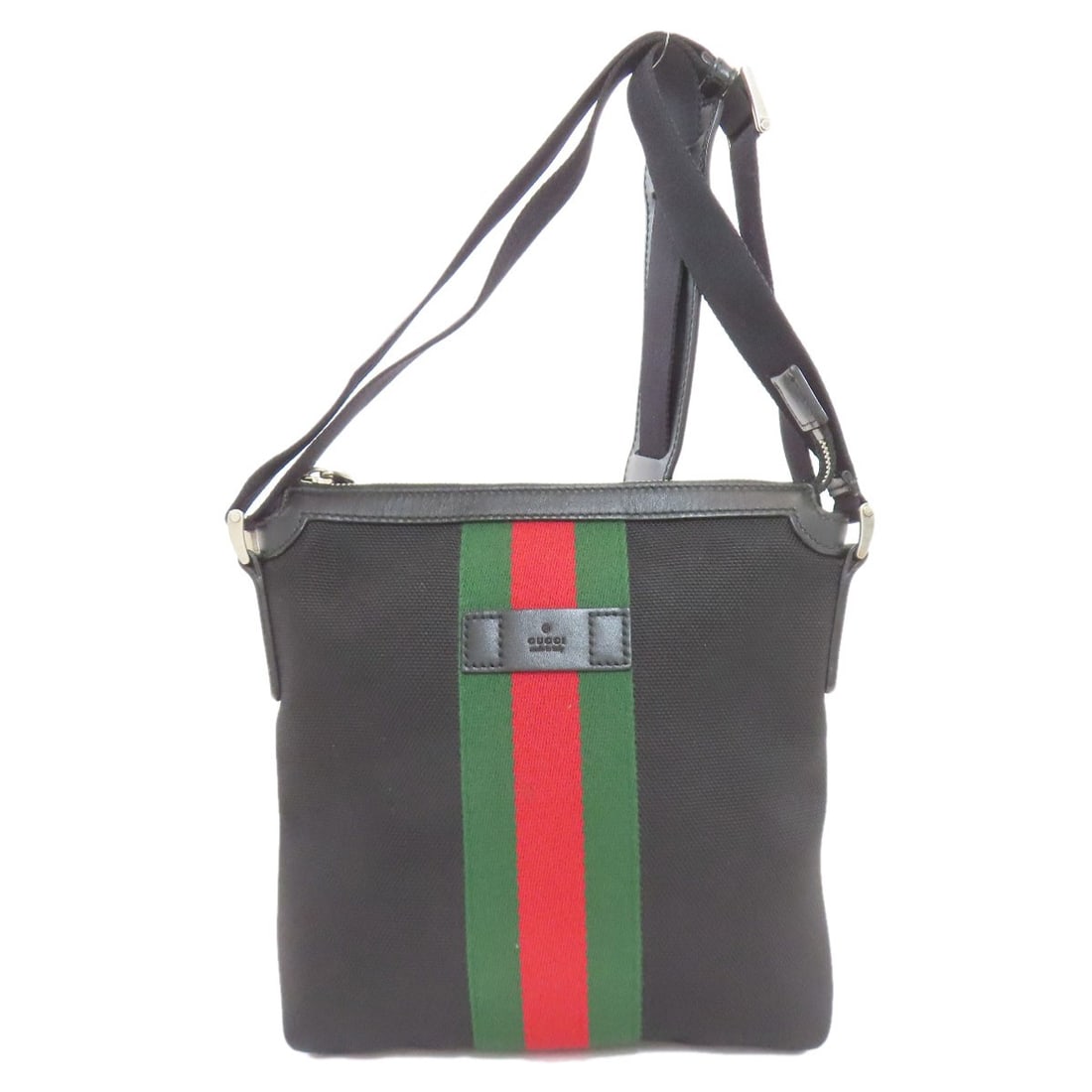 Canvas Leather Shoulder Bag Gucci 471454 Sherry Line: Canvas Leather Shoulder Bag Gucci 471454 Sherry Line Canvas Leather Shoulder Bag in Black from the Sherry Line. This classic shoulder bag features canvas exterior and black interior, with a timeless d