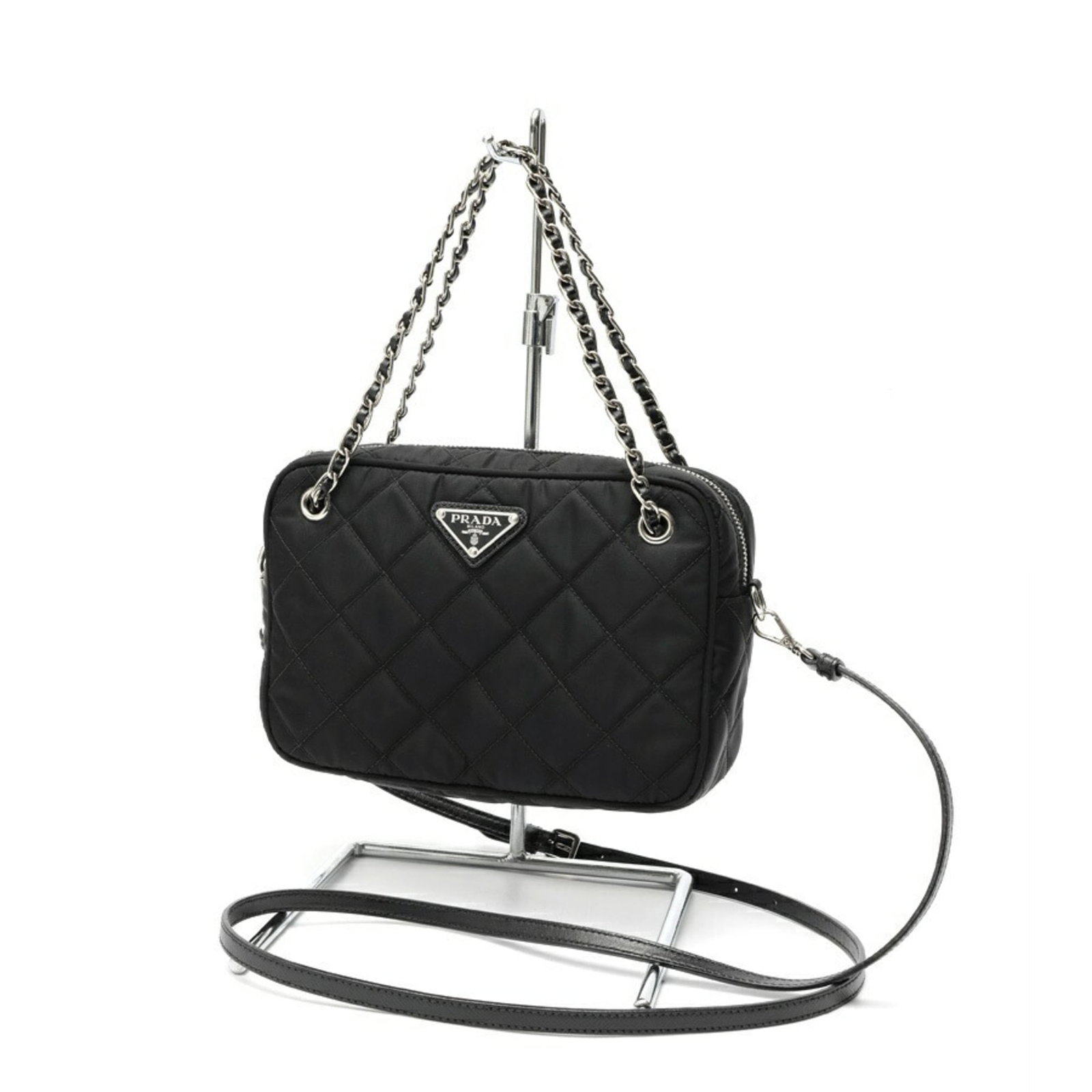 Prada Shoulder Bag Nylon: Prada Shoulder Bag Nylon Prada's Nylon shoulder bag boasts sleek, modern design with a black color and durable nylon material. Its compact size (14cm x 21cm x 6cm) makes it perfect for everyday carry,