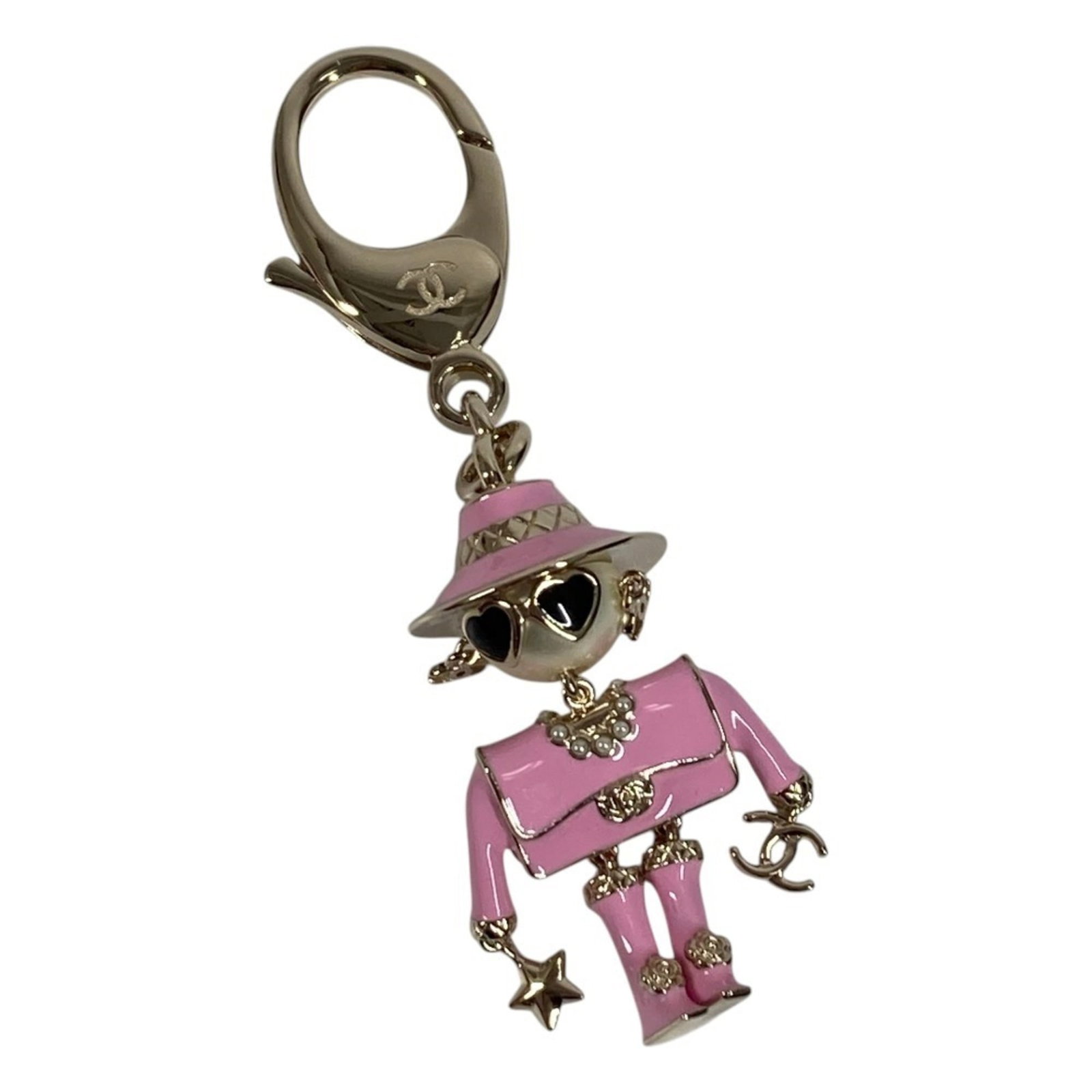 Chanel Keyring Artificial Pearl Metal: Chanel Keyring Artificial Pearl Metal Gold and pink hues shine in this elegant Chanel Keyring Artificial Pearl Metal, crafted with artificial pearl and metal details. The iconic design makes it a styl
