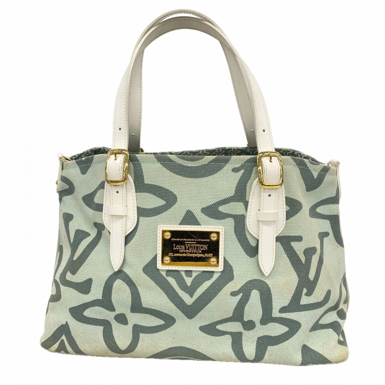 Louis Vuitton Tote Bag: Louis Vuitton Tote Bag The Louis Vuitton tote bag features a vibrant green color and measures 27cm x 40.5cm x 16cm, making it a stylish accessory for women on-the-go. This iconic design is part of the