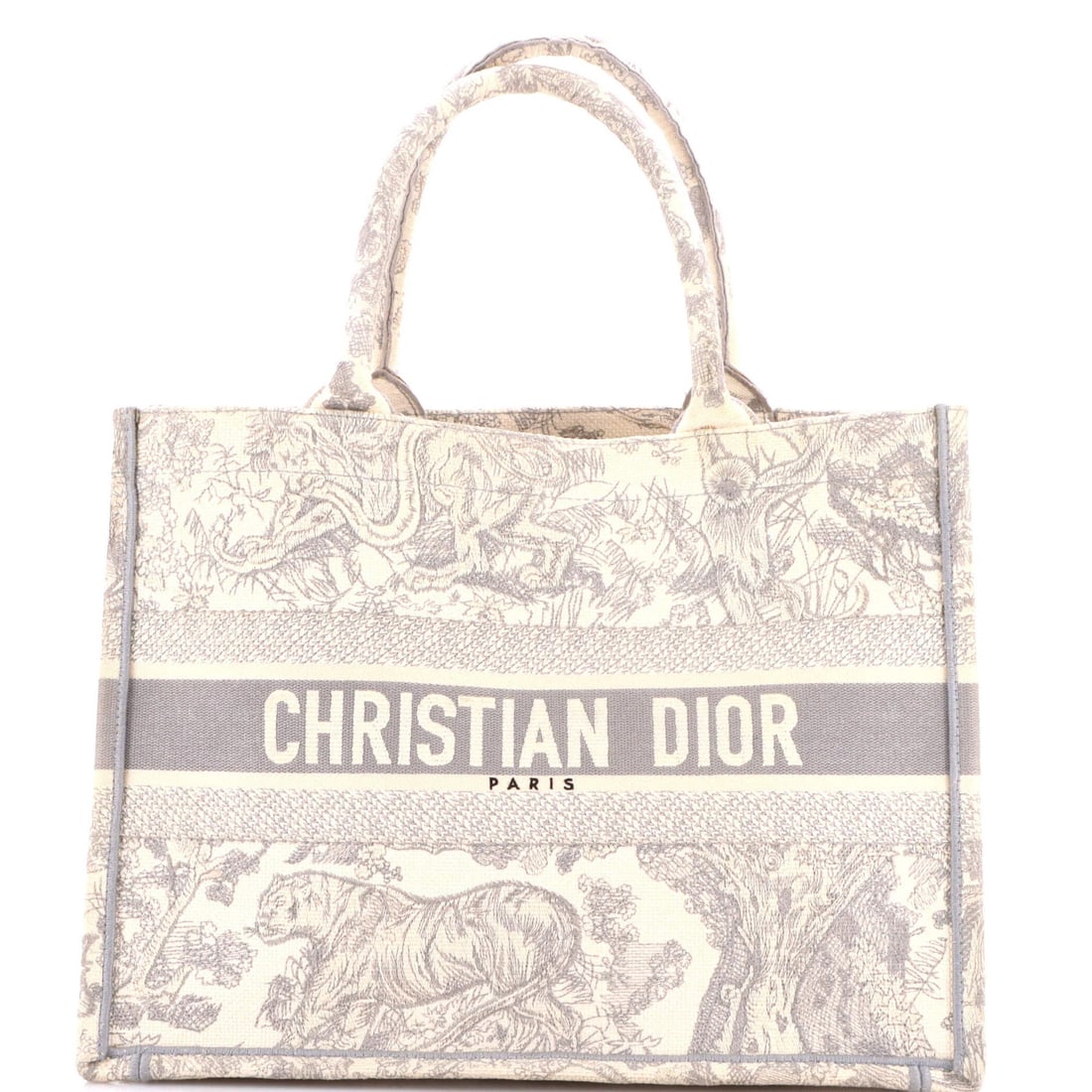 Dior medium canvas tote book embroidered by Christian: Dior medium canvas tote book embroidered by Christian The Dior medium canvas tote book features a stunning embroidered design, adding a touch of elegance to its classic style. Made from high-quality g